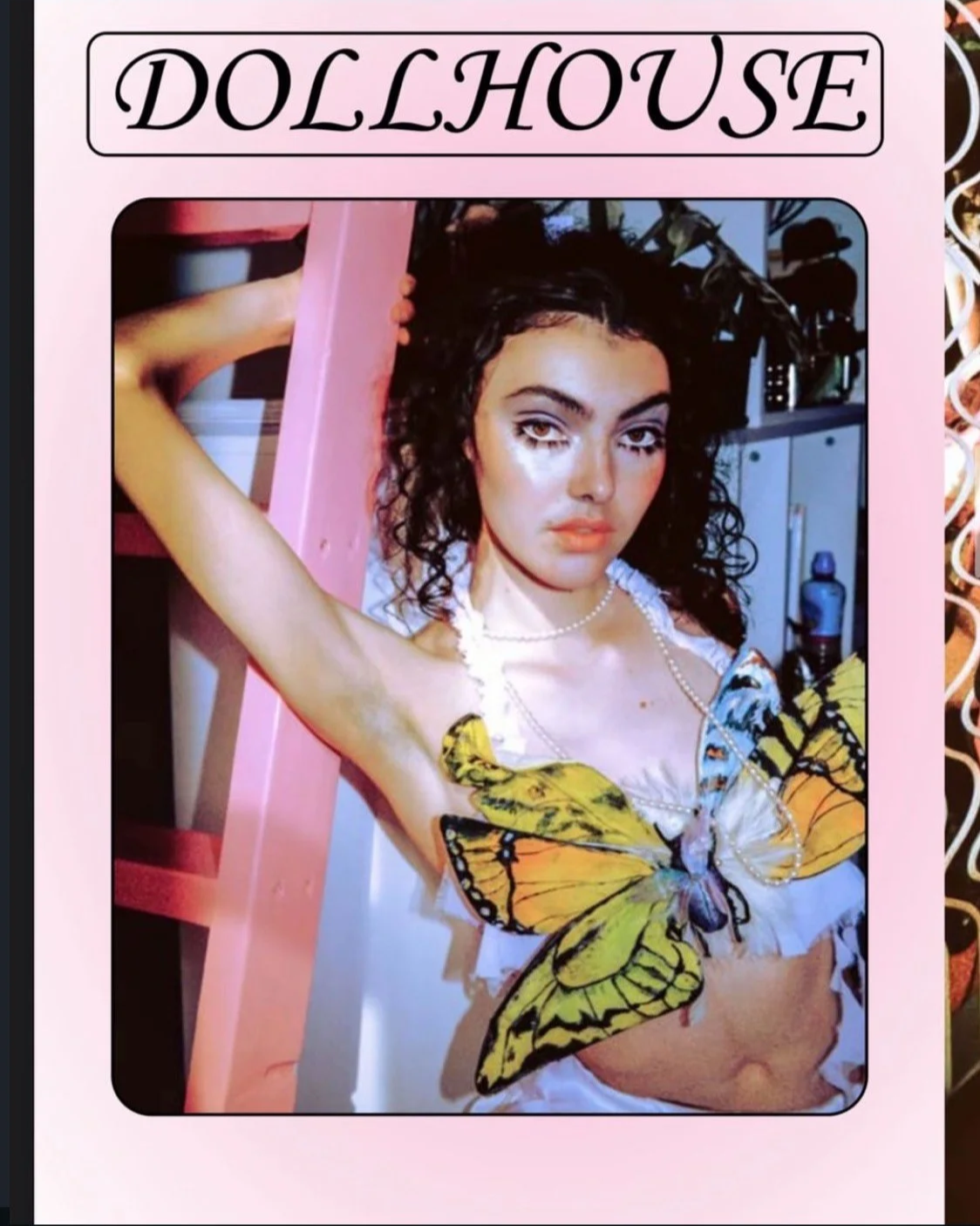 'Dollhouse' for KHAOS-MAGAZINE: Model on a pink ladder illustrating 90s-inspired styling and set design.