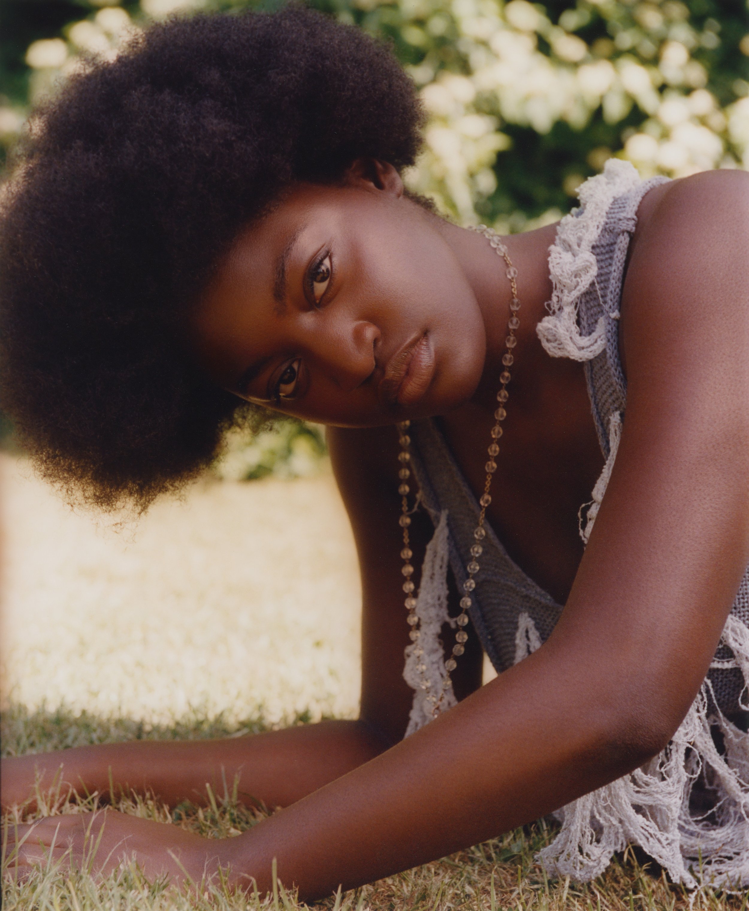 Deconstructed, handmade textile piece illustrating organic silhouettes and tactile fabric manipulation.