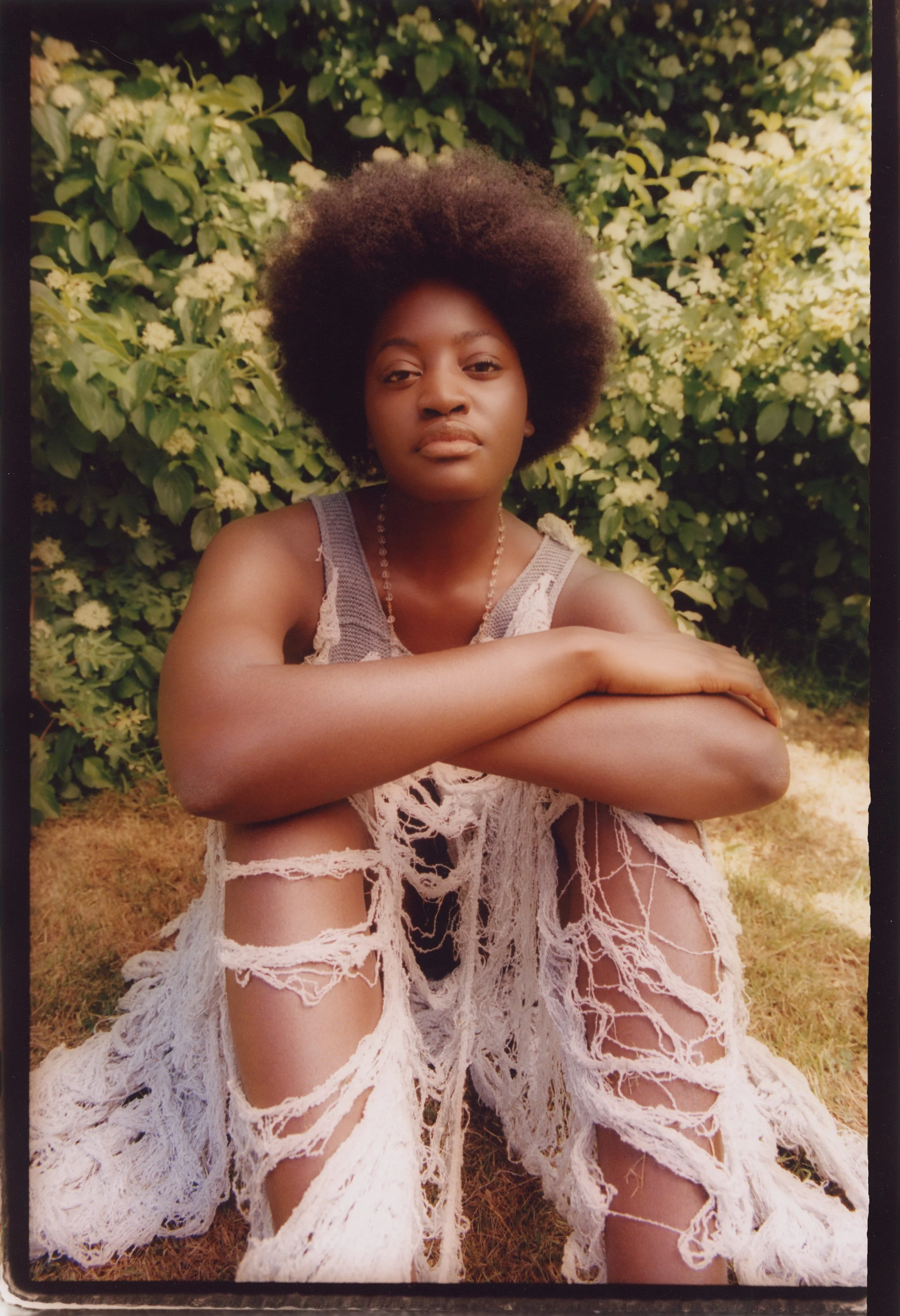 Conceptual fashion design: Hand-torn lace and distressed textile details showcased through natural light location styling, styled by Mara Bernemann.