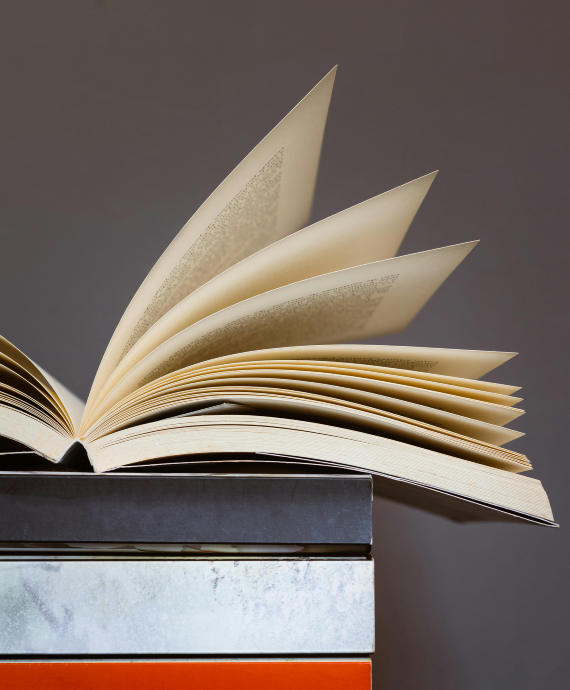 stack of books with top open