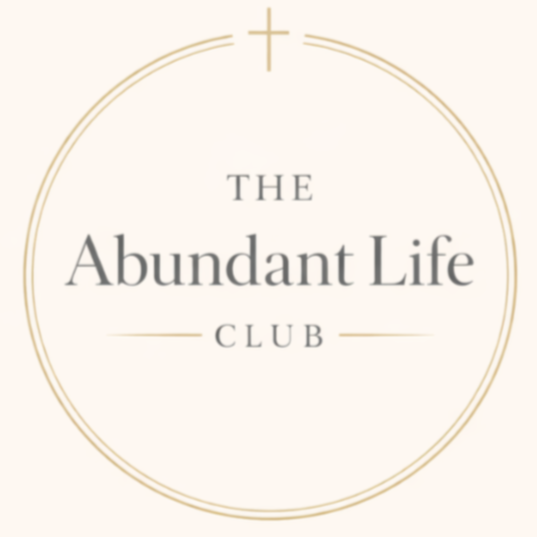 Logo for The Abundant Life Club with a cross symbol at the top and a circular design.