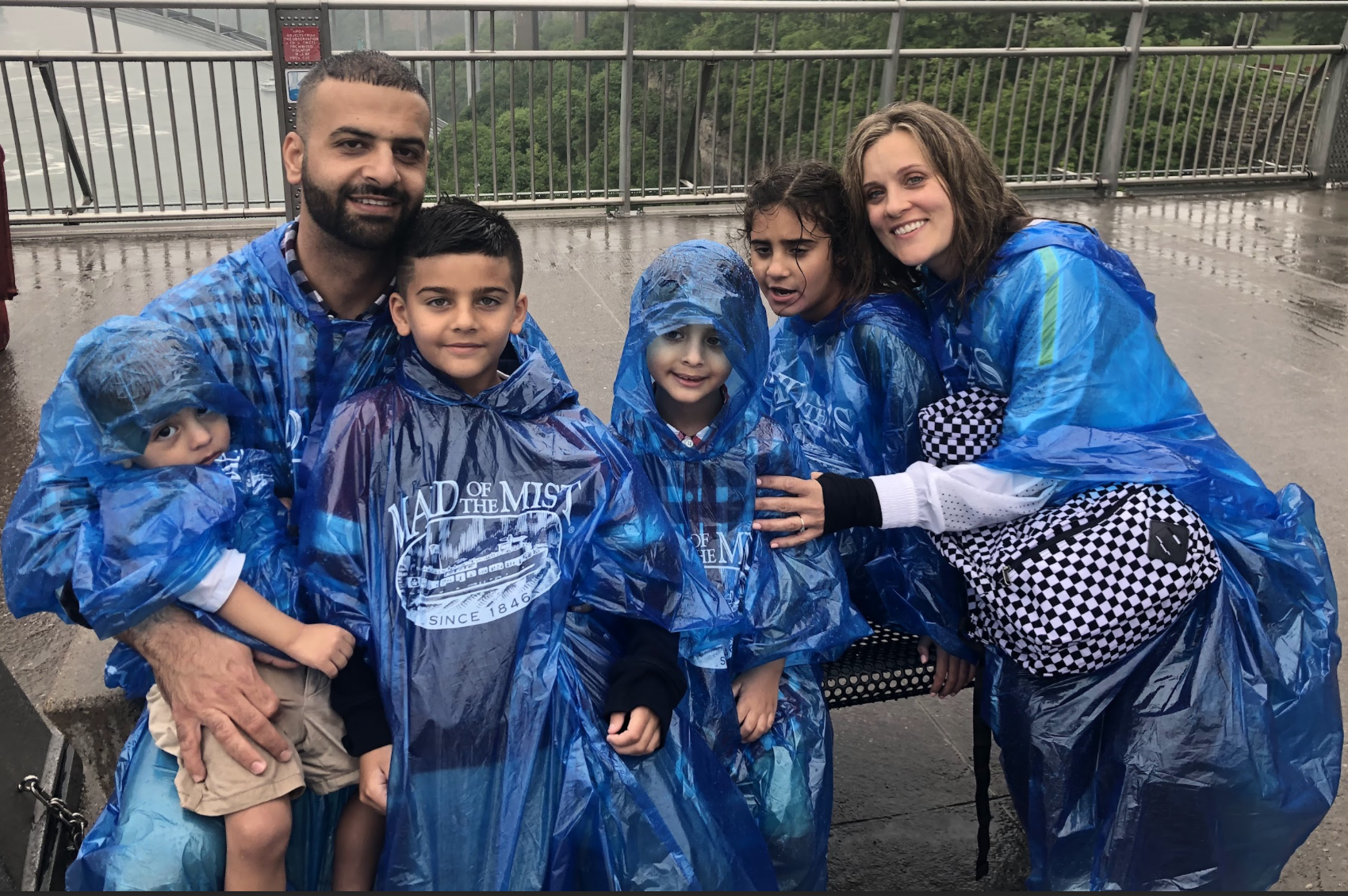 A Mom and Dad with four kids