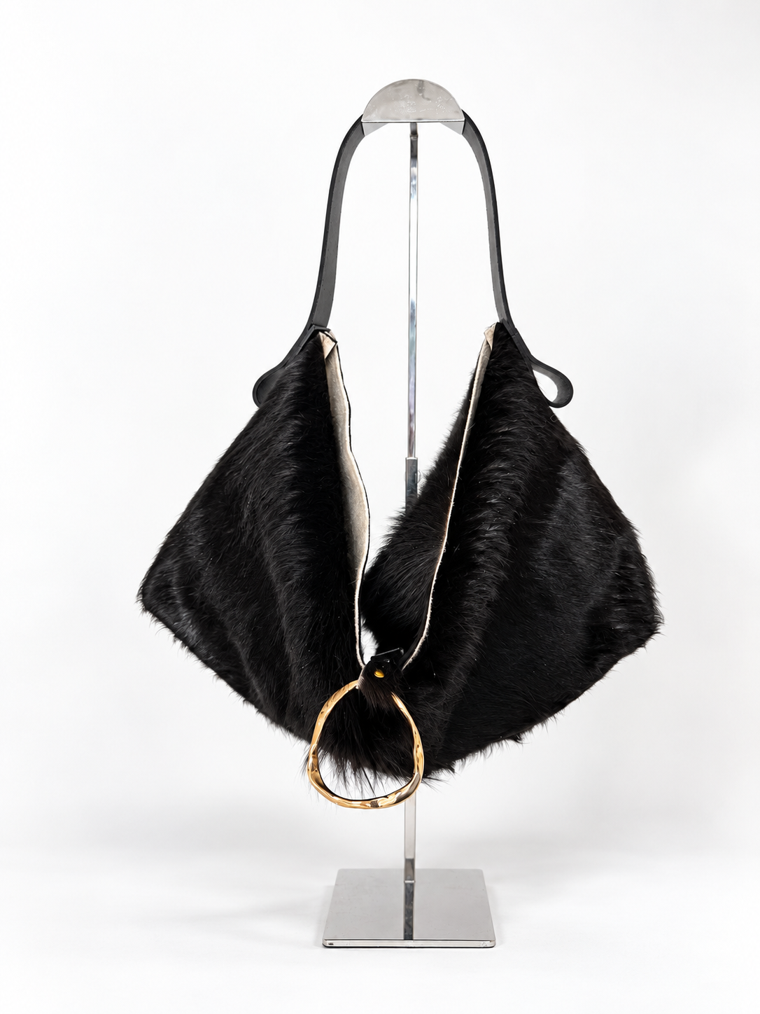 The Sieren Leather Bag in Longhair Cowhide and Black Strap