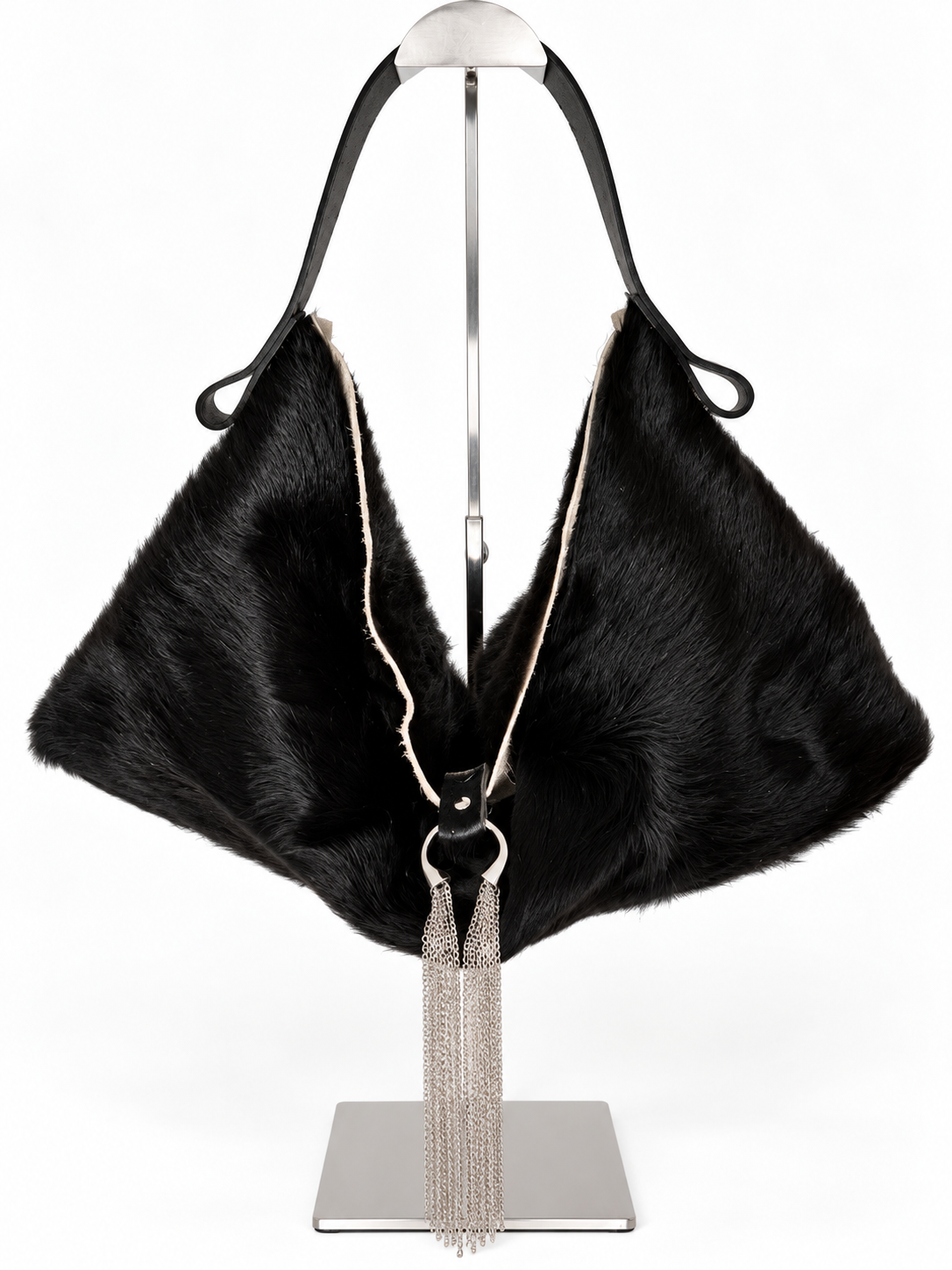 The Sieren Leather Bag in Longhair Cowhide and Black Strap