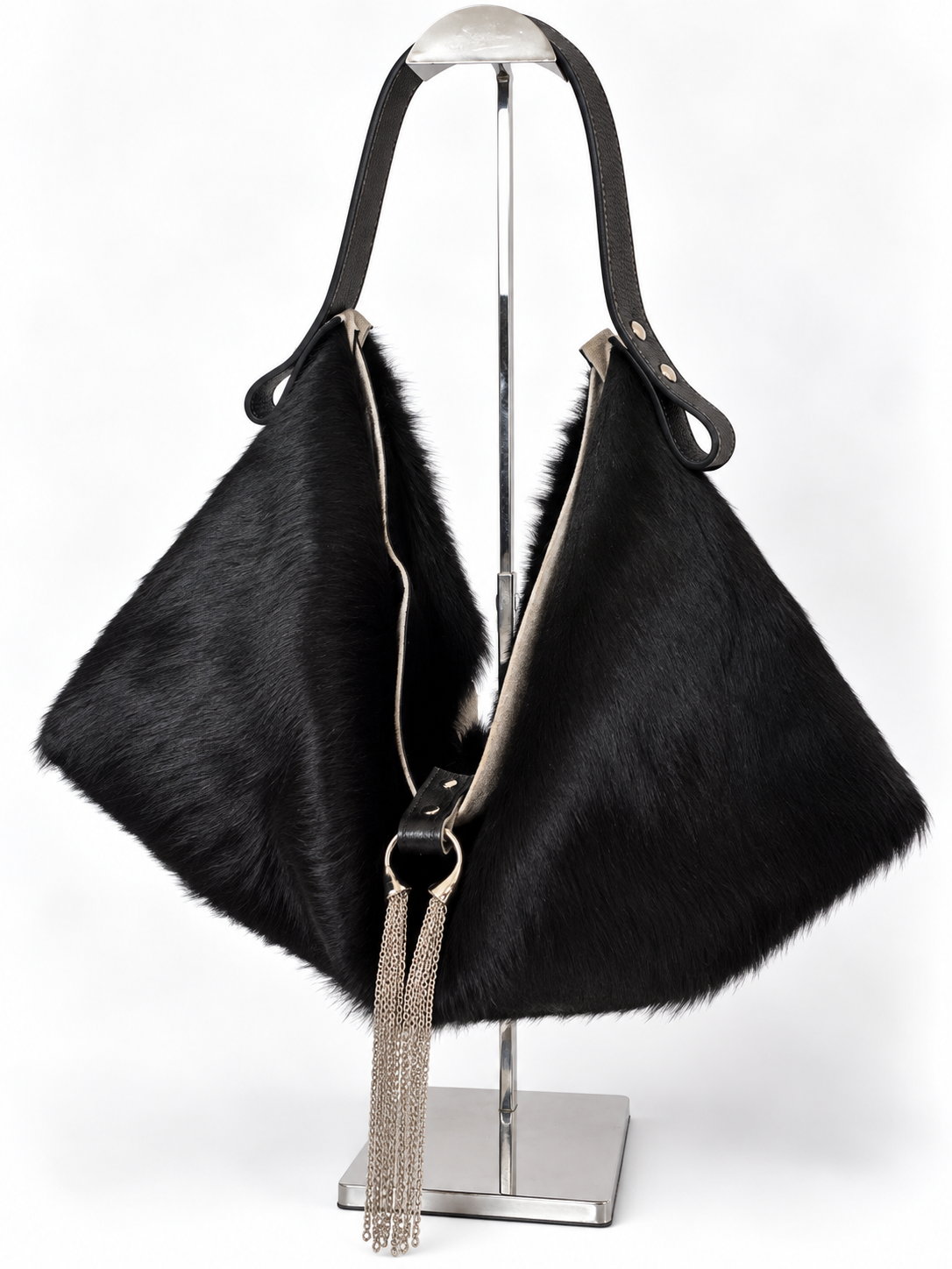 The Sieren Leather Bag in Longhair Cowhide and Black Strap