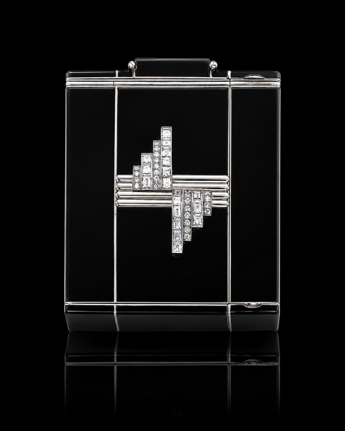 Un briquet en acétate noir avec un décor en cristal en forme de pouce levé