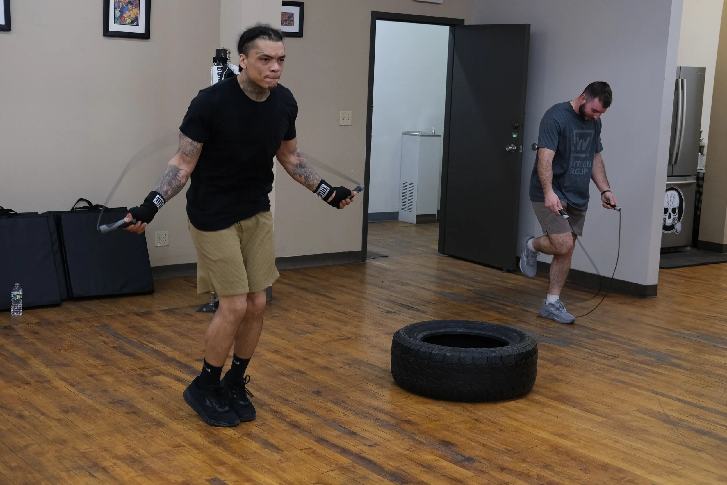  Albert Appleton (left) and Francis Cerio complete jump rope exercises. Photo by Jirah Johnson. 