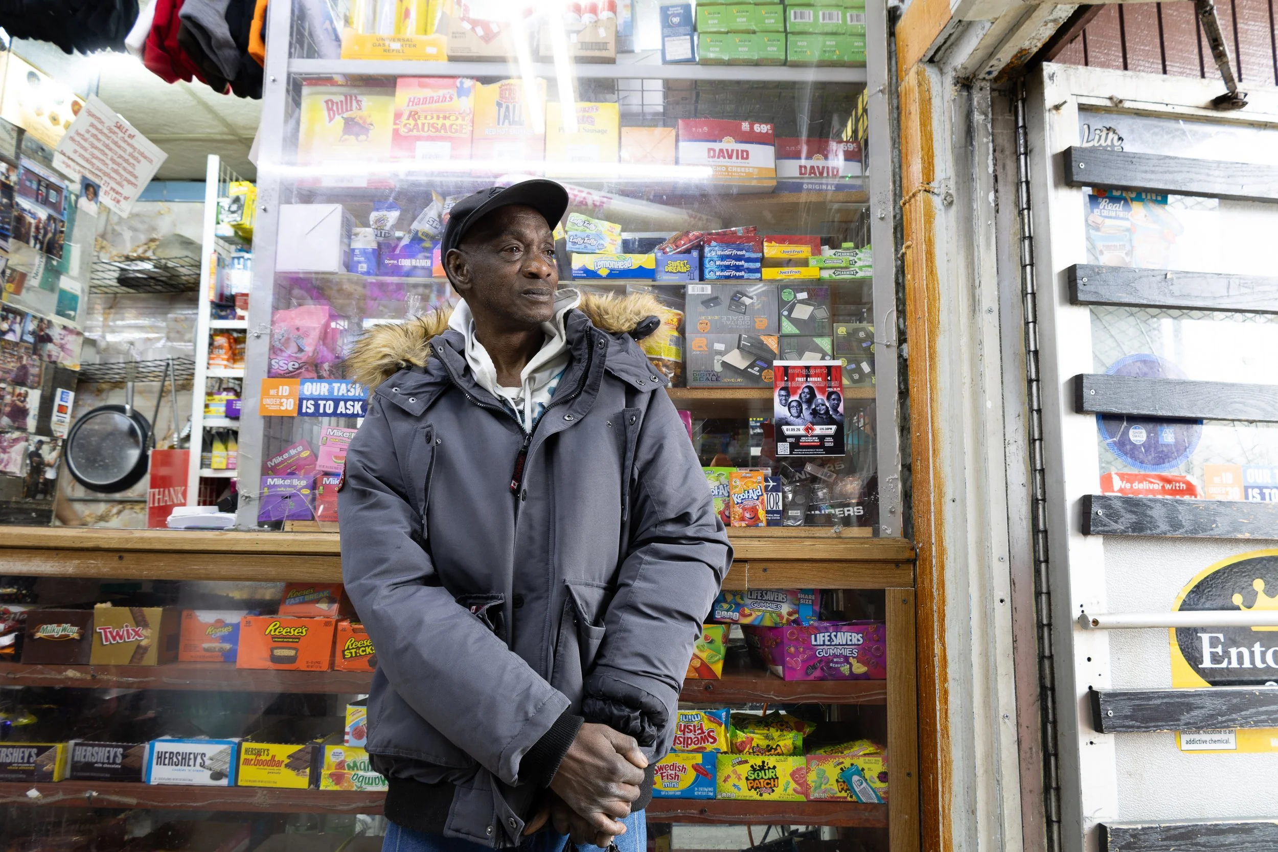  A man poses in front of the counter at Ze Mart on Jan. 10, 2026. Photo by: Destinyi Fernandez 
