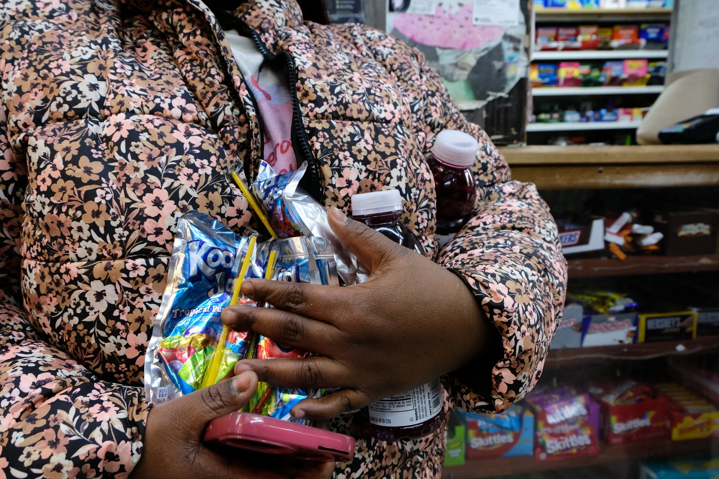  A woman's arms hold an assortment of drinks inside Ze Mart on Jan. 10, 2026. Photo by: Micah Orieta 