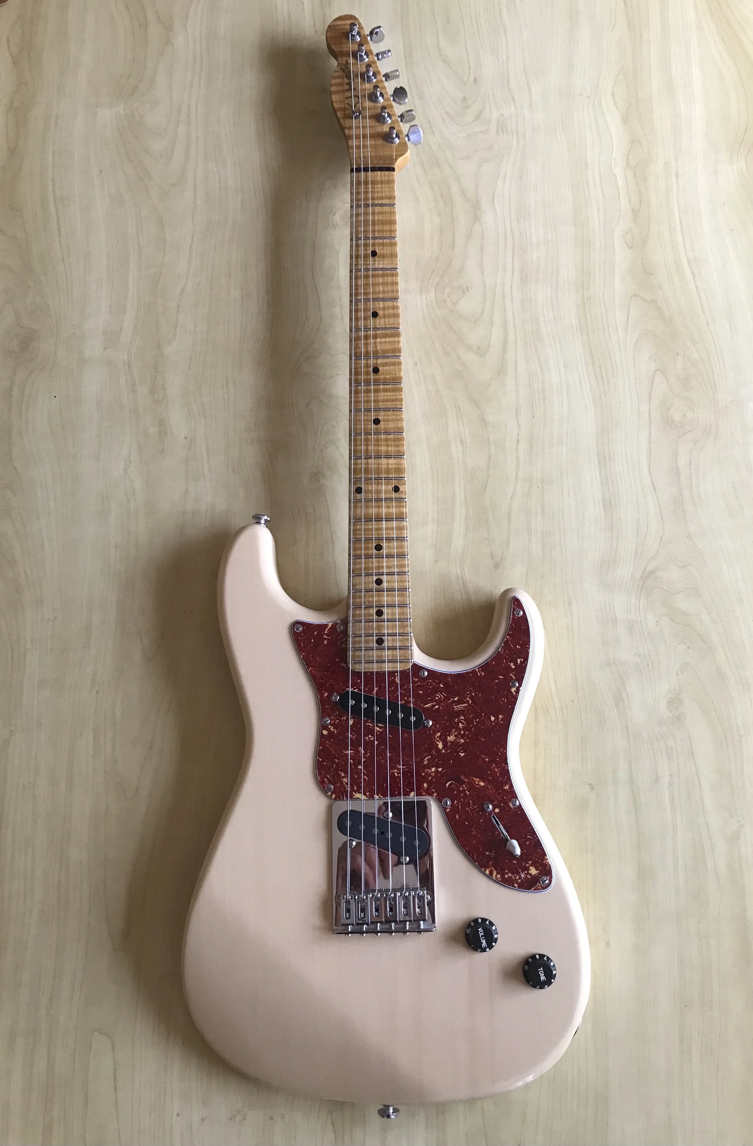 Hybrid Strat/Tele.Yellow Cypress body and  Bigleaf flame maple neck