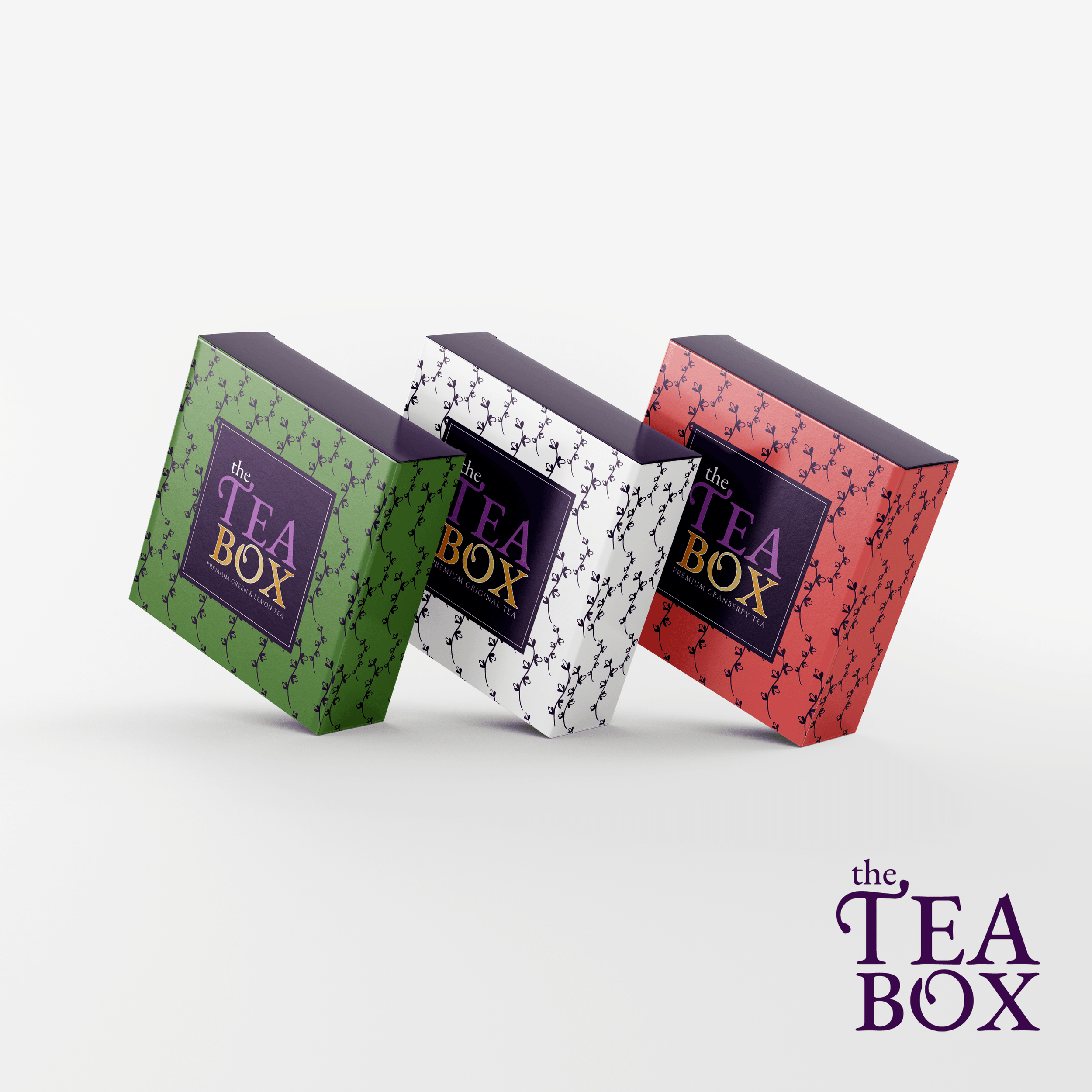 Three tea box packages with floral patterns in green, black and white, and pink colors, partially visible, with the hashtag #theteabox displayed in purple text in the bottom right corner.