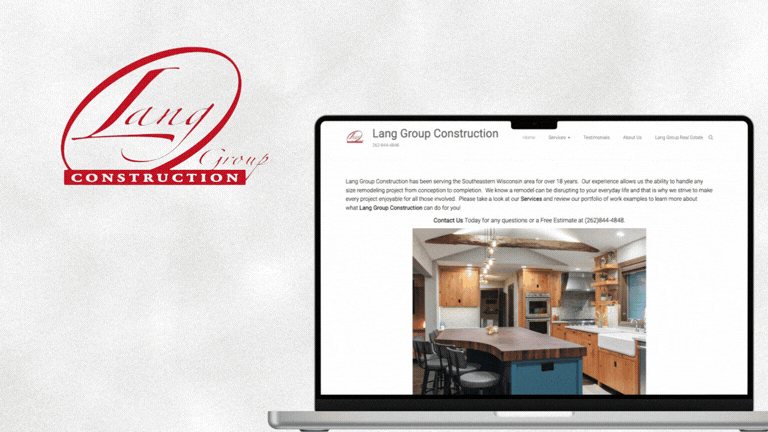 Computer screen showing a construction company's website, with a kitchen renovation image.