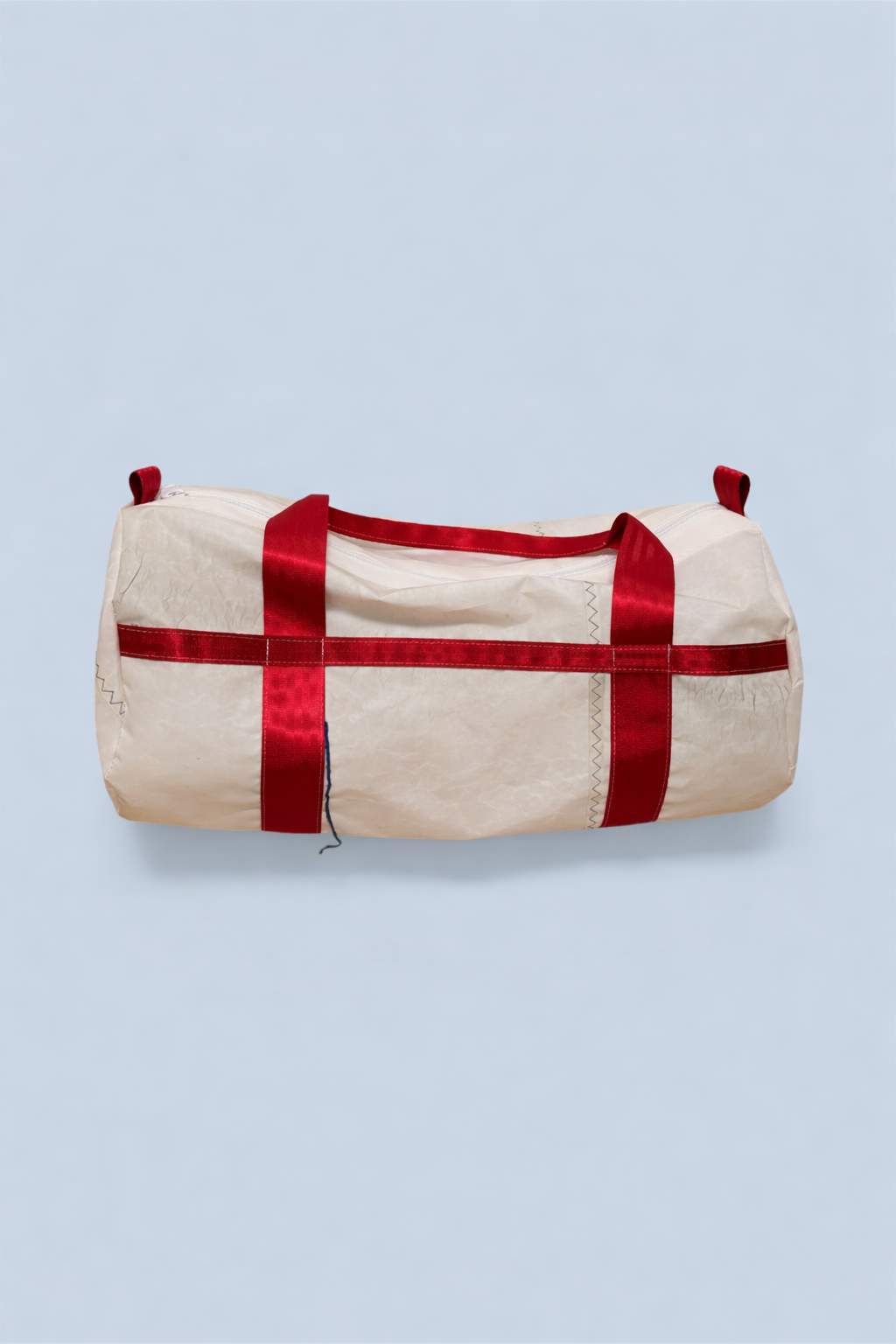 Red accented sailcloth duffel bag.png