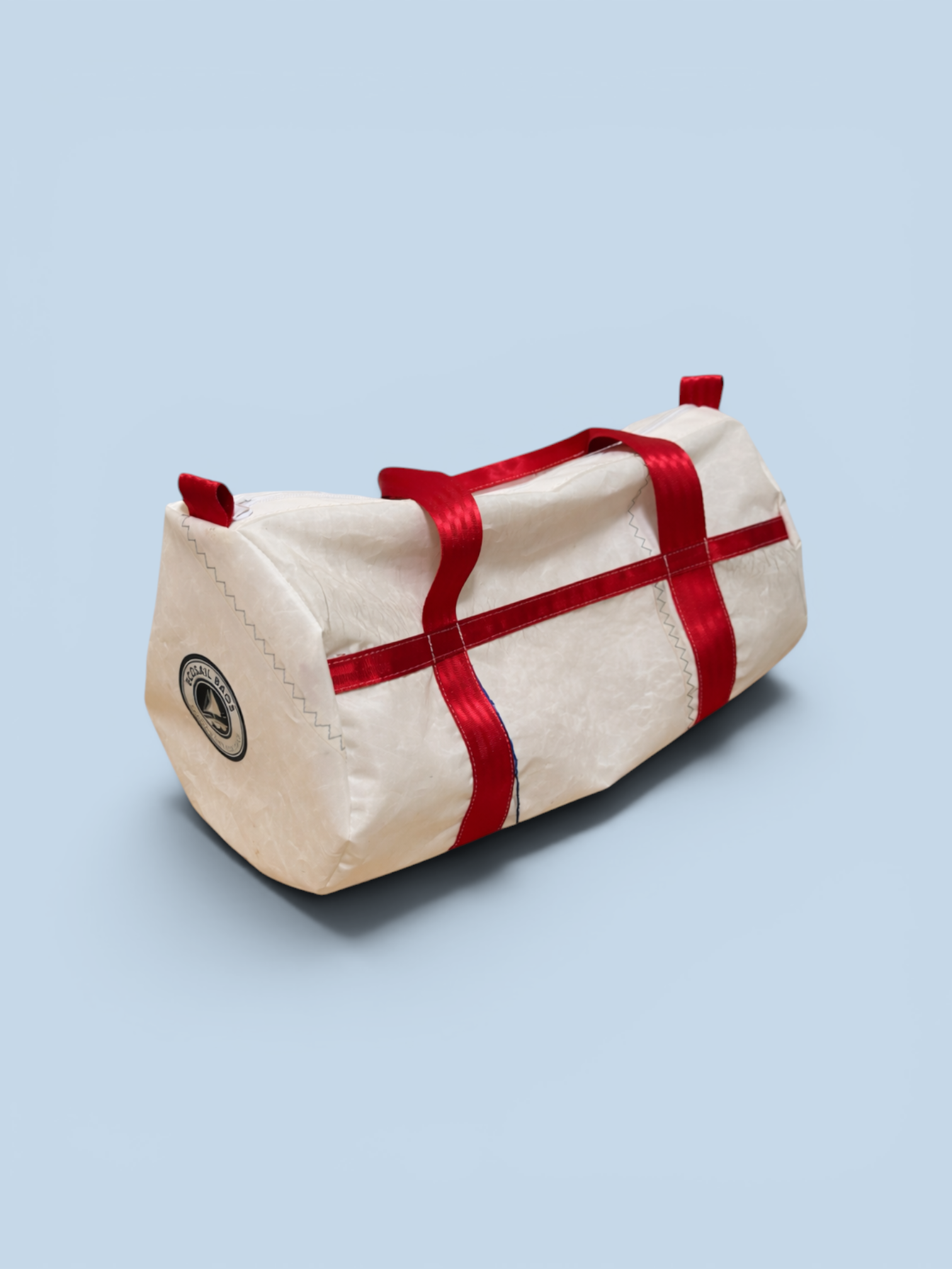 White sailcloth duffel with red accents.png