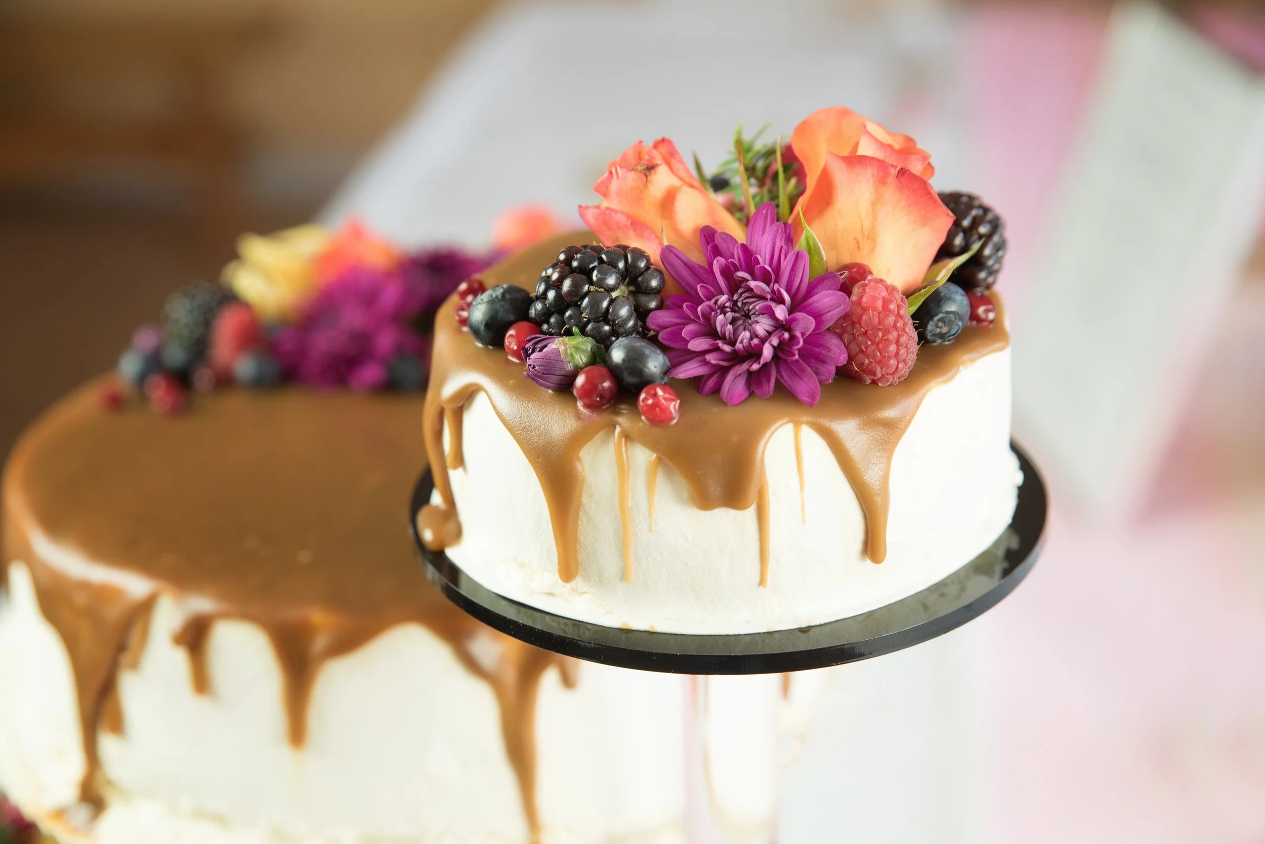 Laurie’s customers, Evan and Kade, running down a mountain after getting married. 