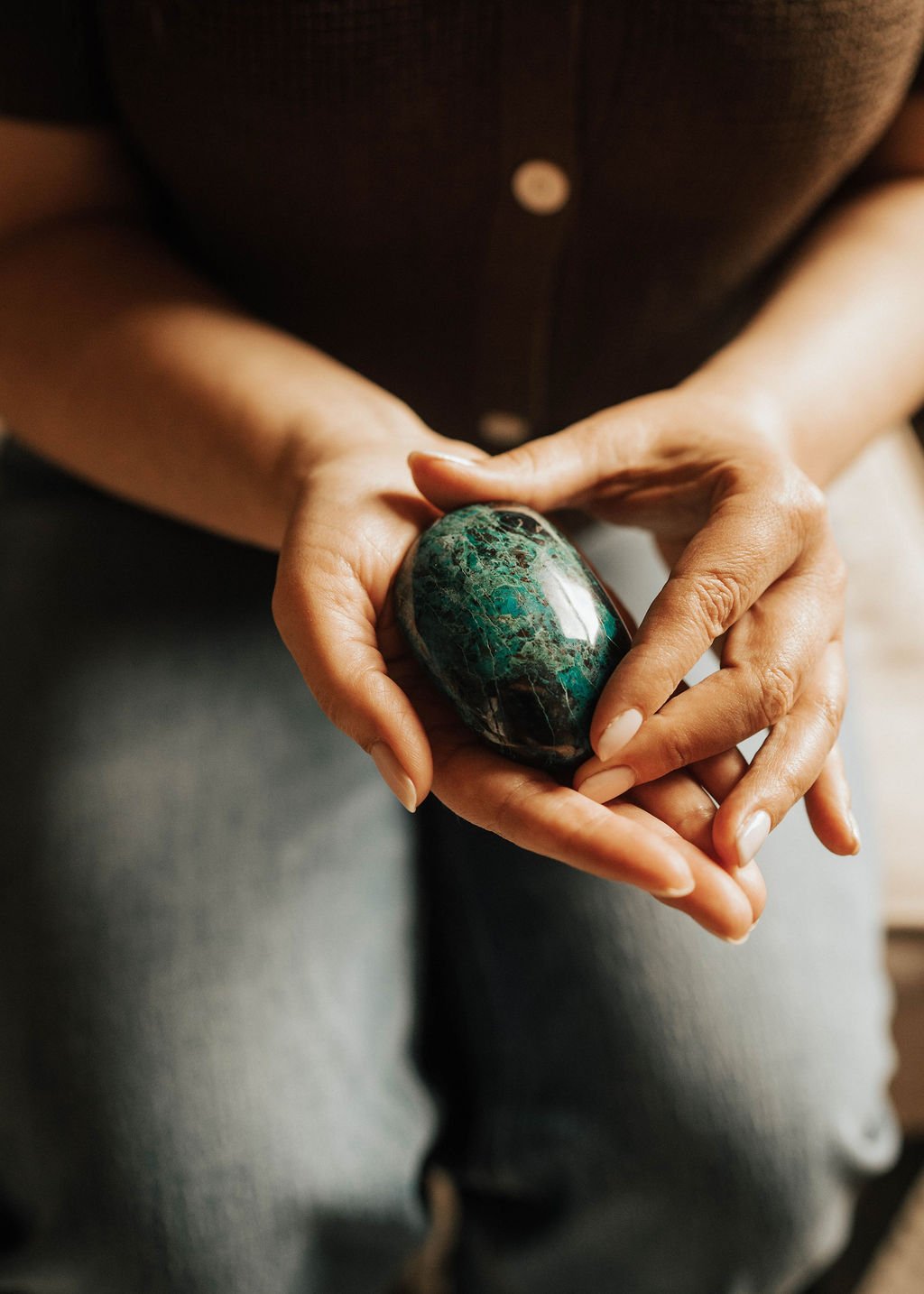 Kristie LaRocca holding a stone