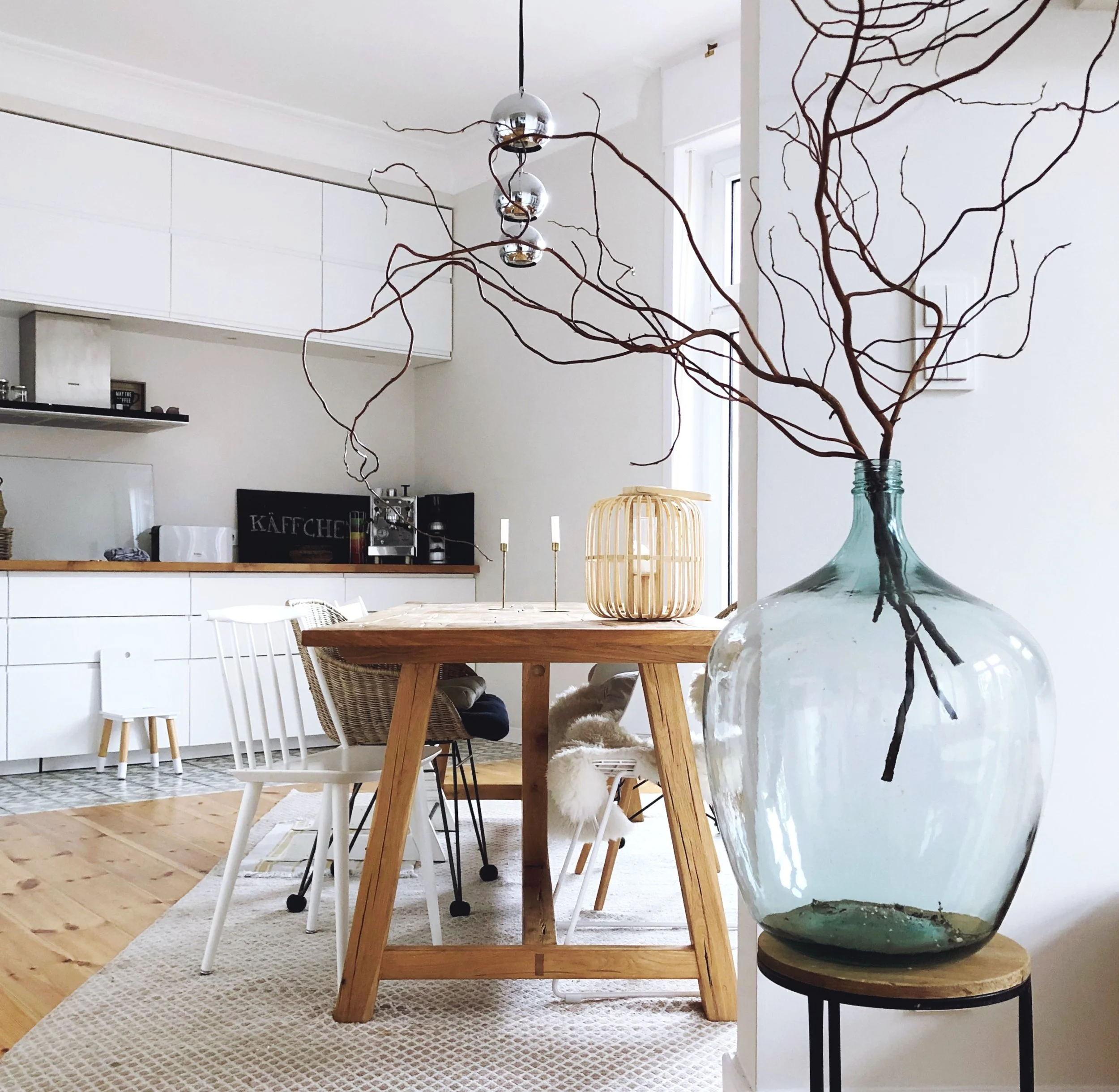 Curated interior design materials and textural elements showing terra and carbon color palettes