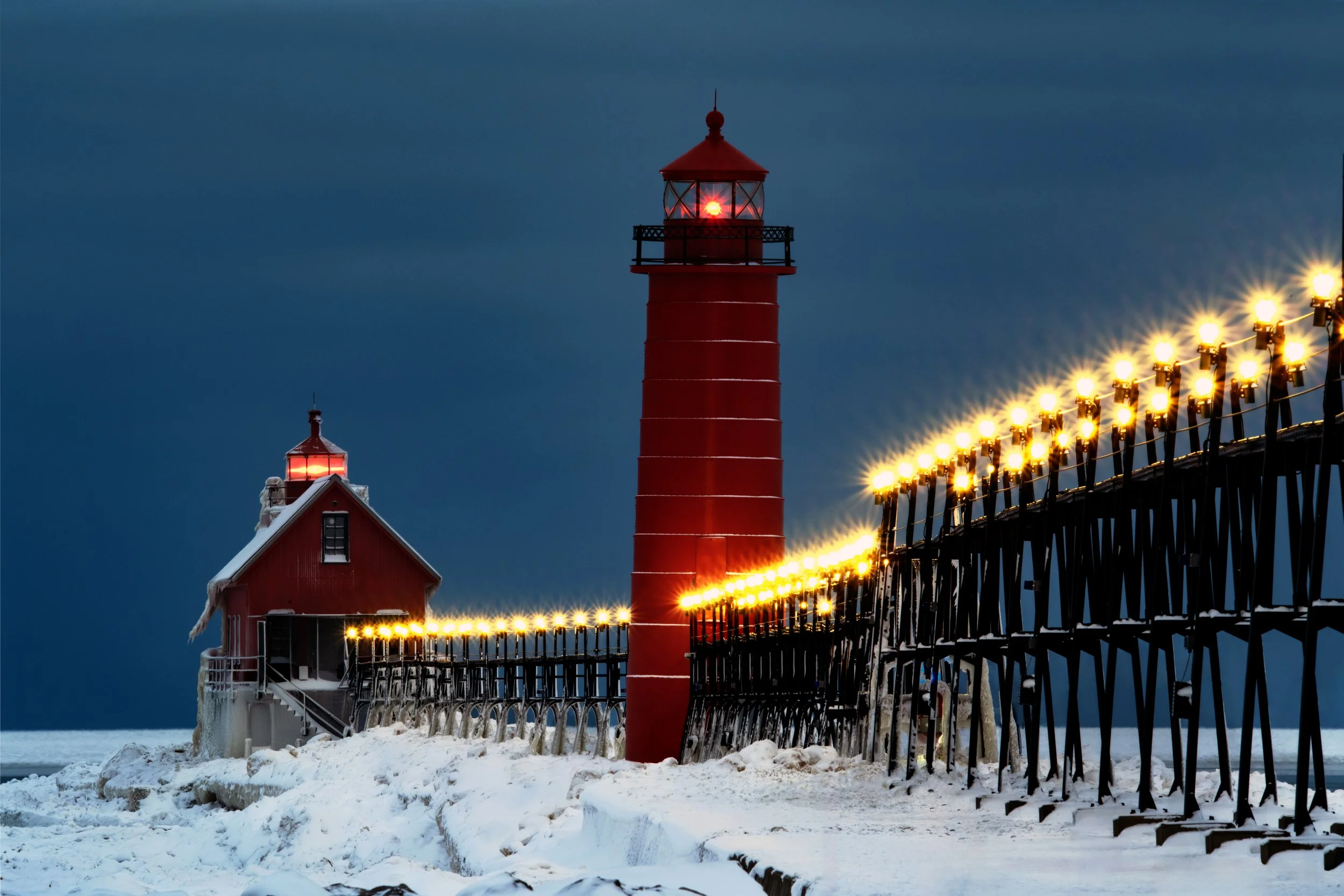Grand Haven Lighthouse glowing after sunset in January 2026.