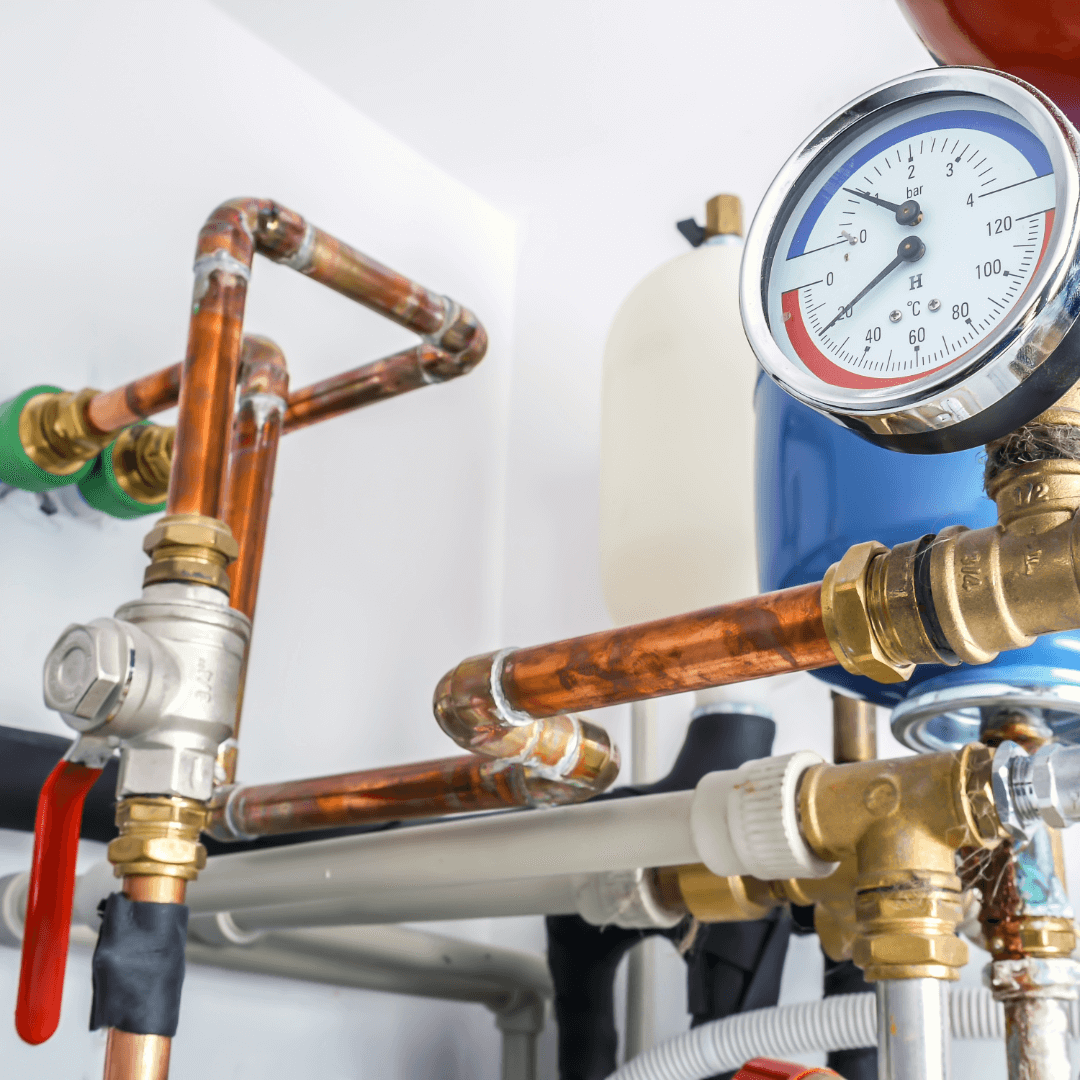 Pipes and thermostat for a new heating system in a home