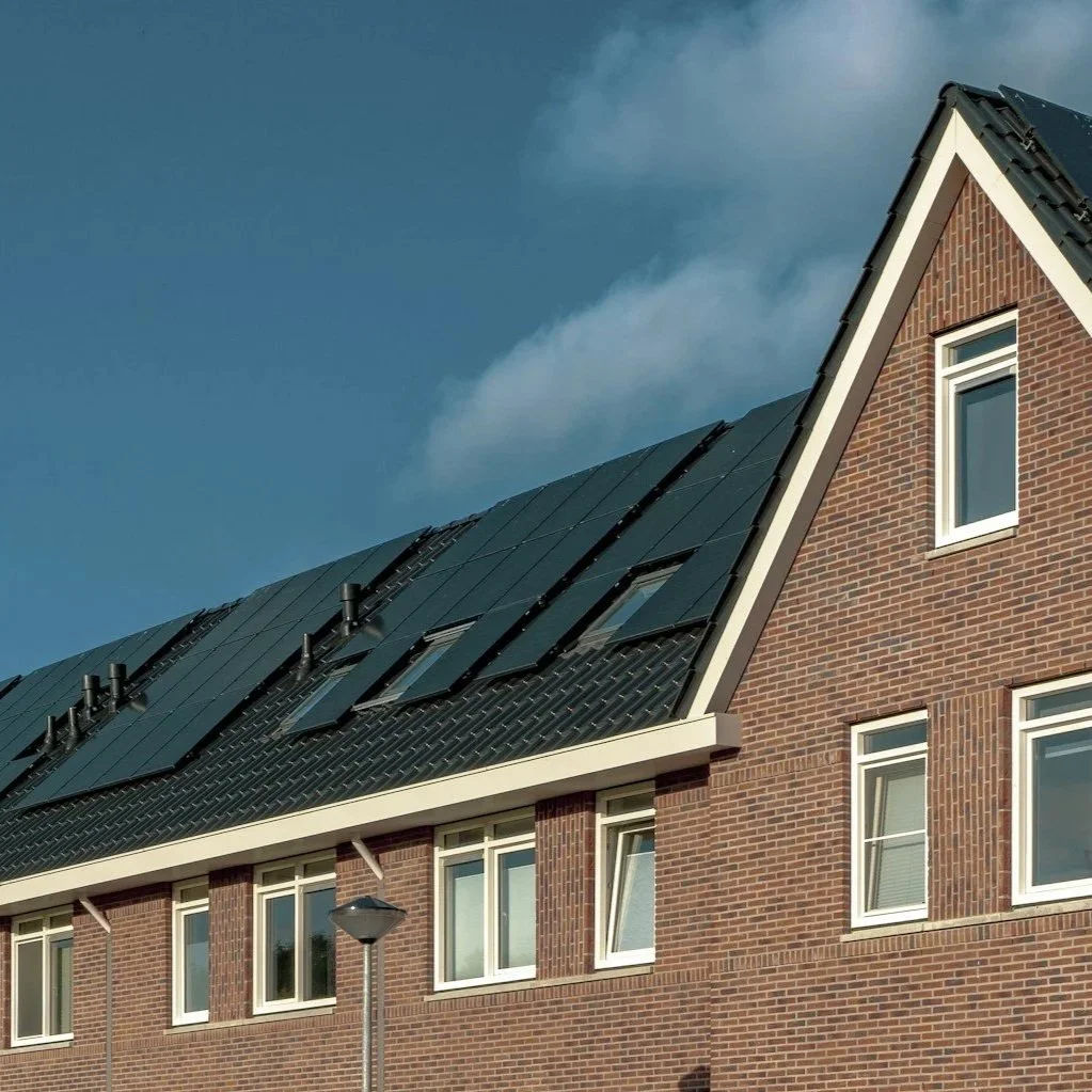 Professionals in high vis workwear assessing commercial roof space
