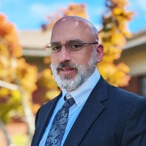 A portrait of Attorney Aaron Archambault.