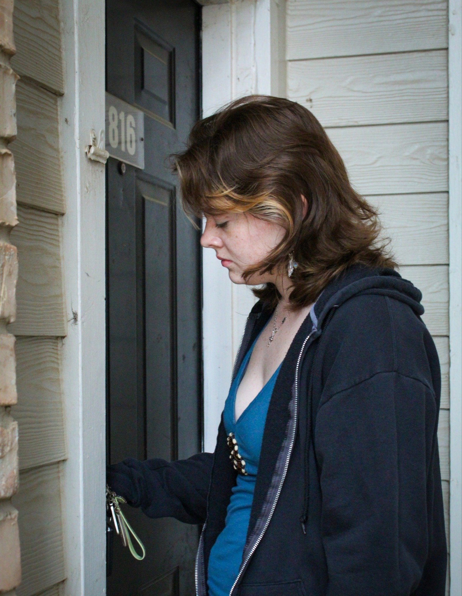 Coming Back Home - University of North Texas Senior Kat Hardy unlocks the front door to her apartment in Denton on Tuesday, May 5, 2026. (photo by Genevieve Kaufmann)