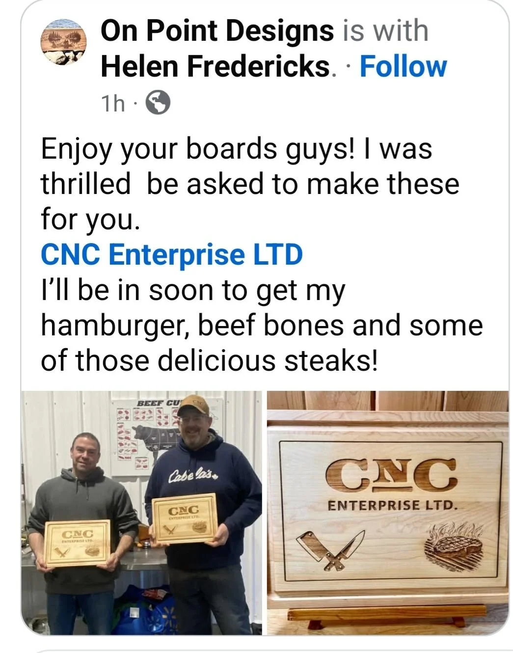Two men standing indoors holding wooden plaques with the CNC Enterprise LTD logo. One man is wearing a gray hoodie, and the other is wearing a navy hoodie and baseball cap. A sign with a cow silhouette, a meat cleaver, and a cooked steak is on the wall behind them.
