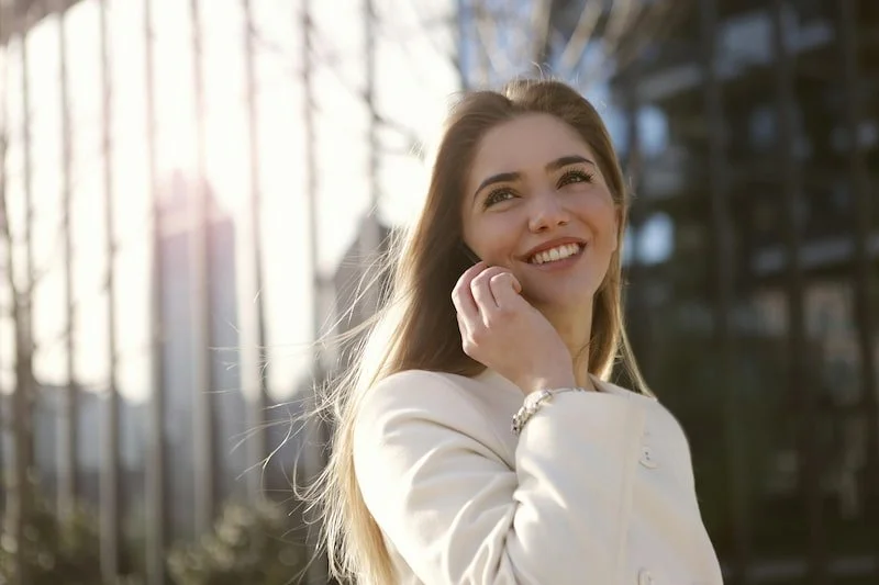 A smiling woman looking very happy