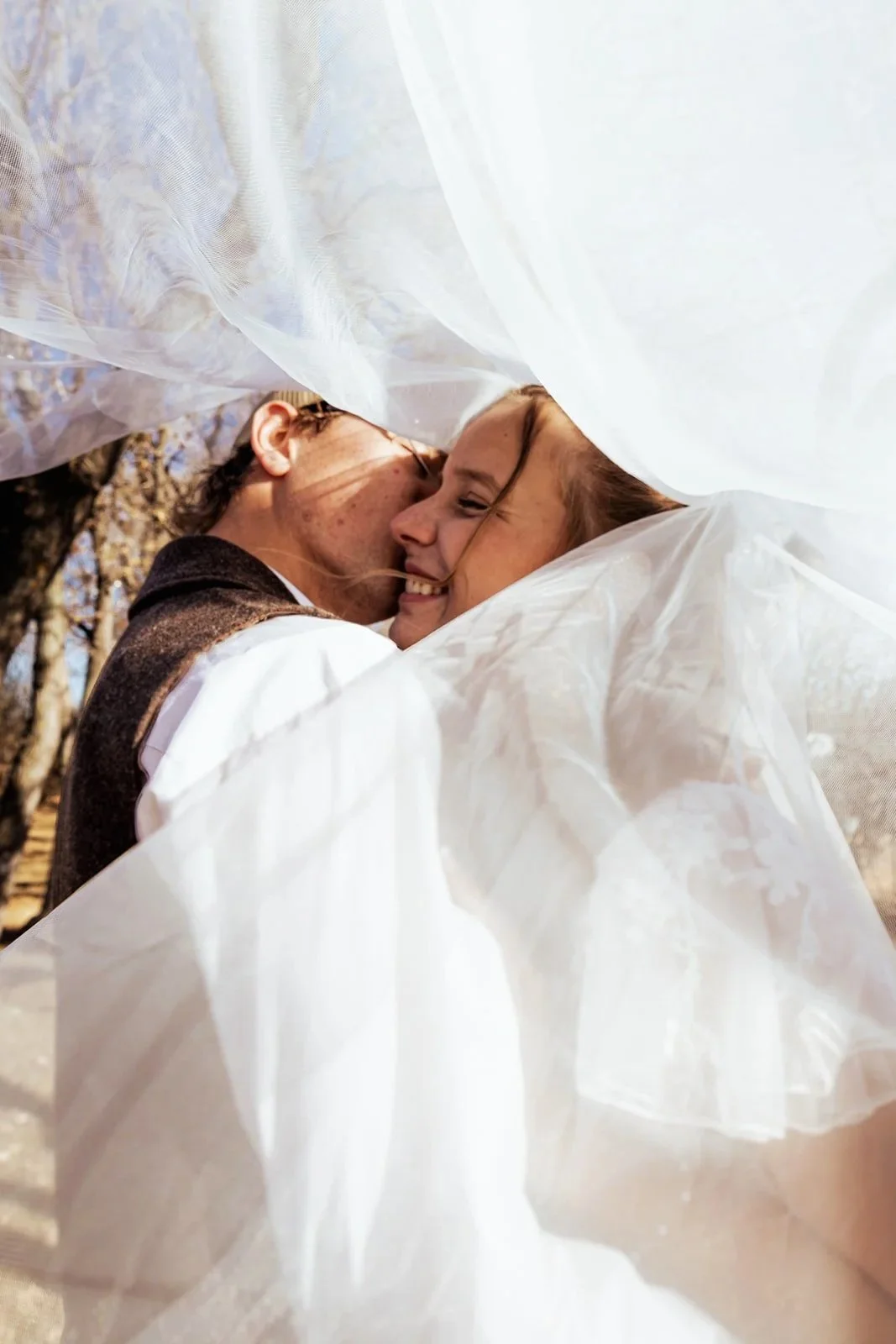 Bride and groom portraits on open Alberta prairie at Open Country Farm wedding venue near Calgary