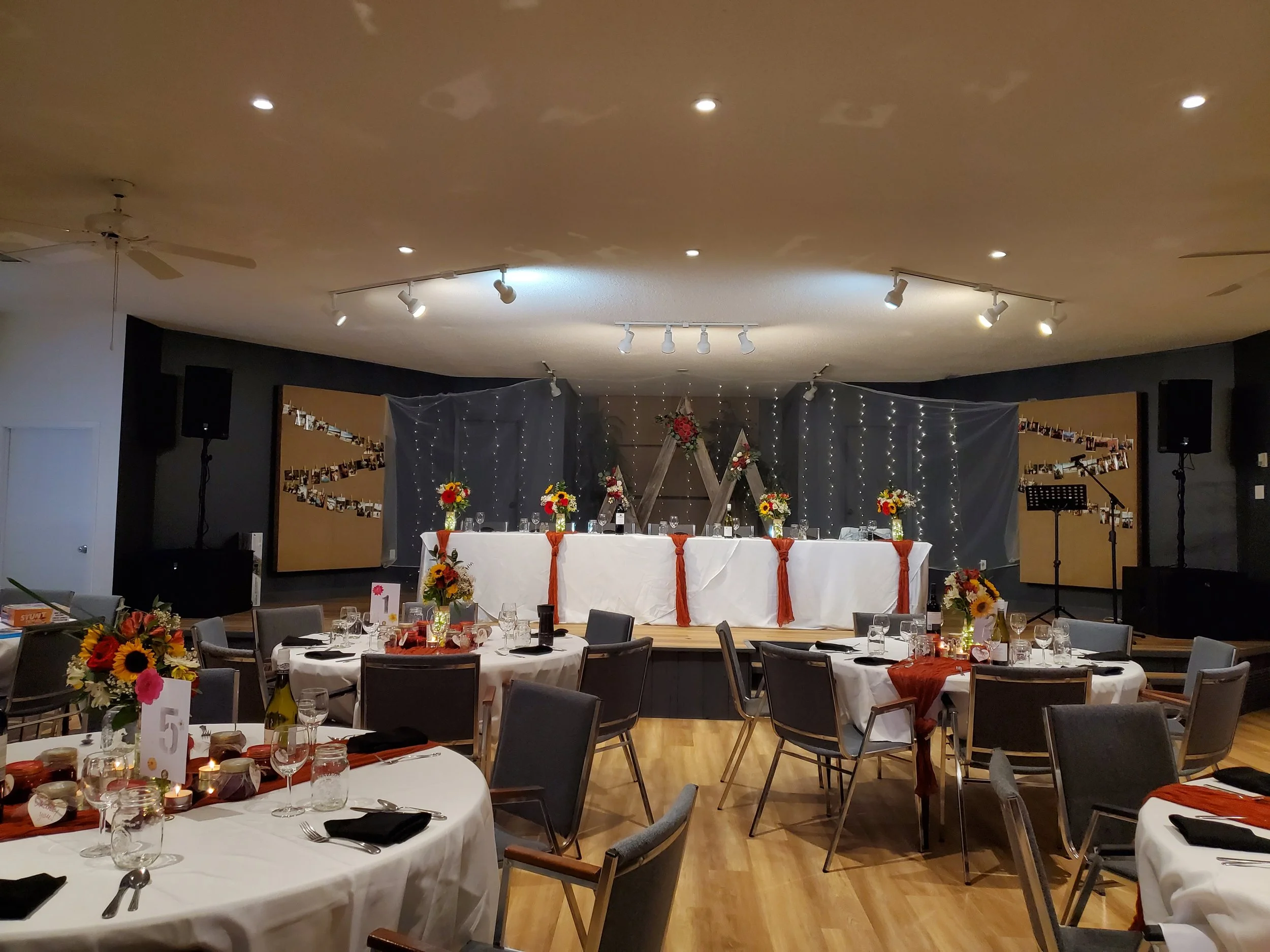 Wedding reception set-up inside the auditorium at Open Country Farm wedding venue, setting for up to 120 guests, at the best hidden gem event centre in Central Alberta, near Red Deer Alberta 
