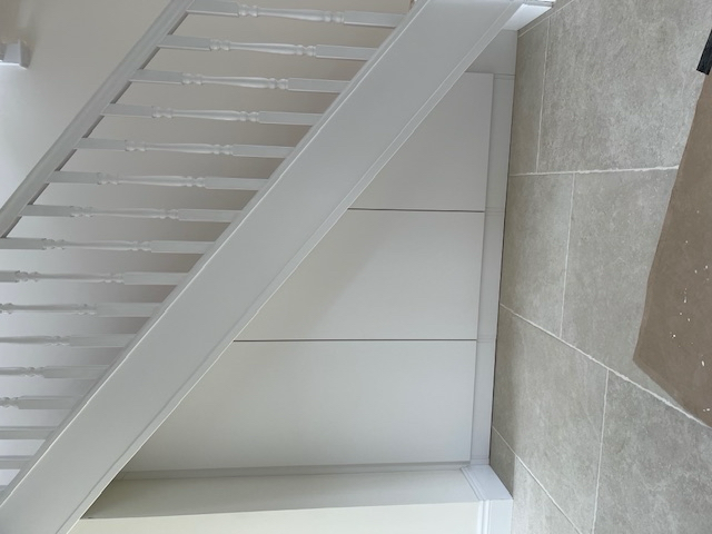 Under stairs cupboards.png