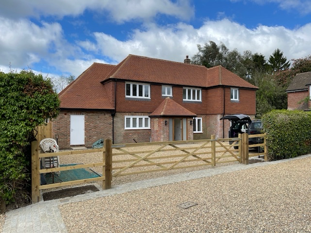 House with new front gates.png