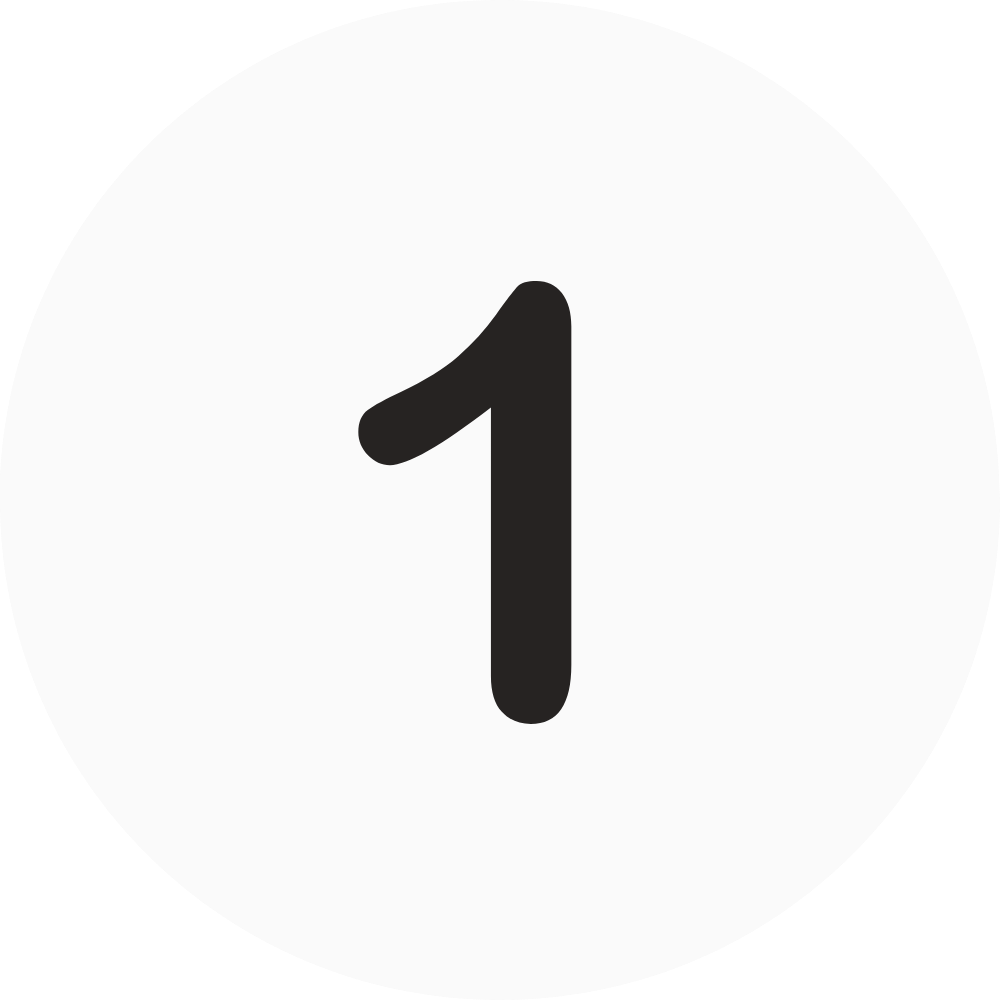White circular sign with the number 1 in black, indicating the number one lane or position.