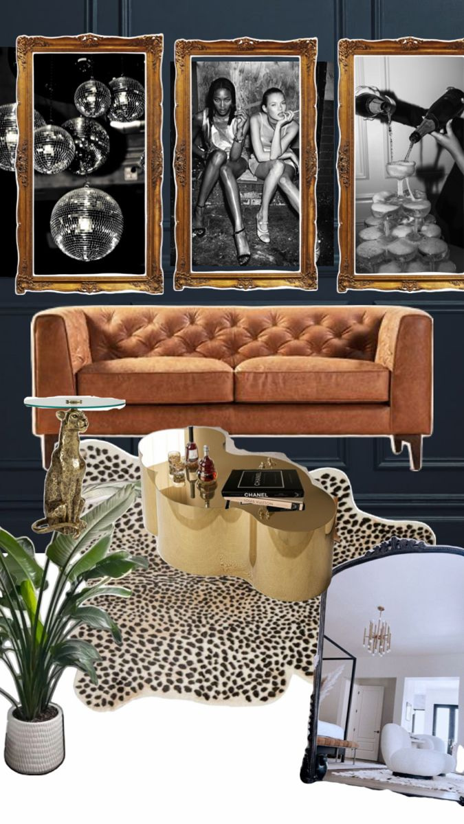 Living room with three framed black and white photographs on a dark wall, a rust-colored tufted sofa, a cowhide rug, a gold coffee table with bottles and a black book, a potted plant, and a standing mirror reflecting a modern white armchair and chandelier.