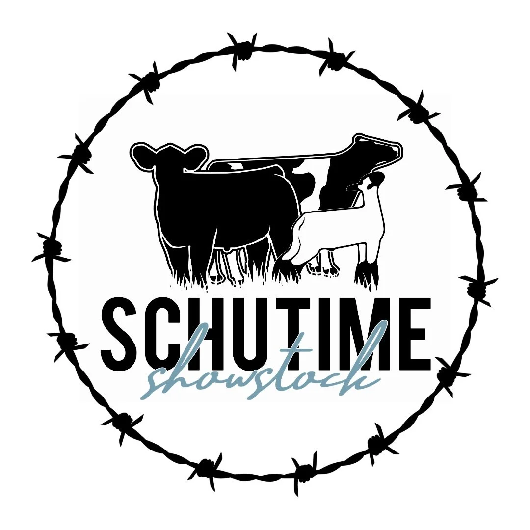 Logo with a barbed wire circle, featuring silhouettes of a cow, a calf, and a calf with a spotty coat, with the text 'SHUT ME' in bold and 'showstop' in cursive.