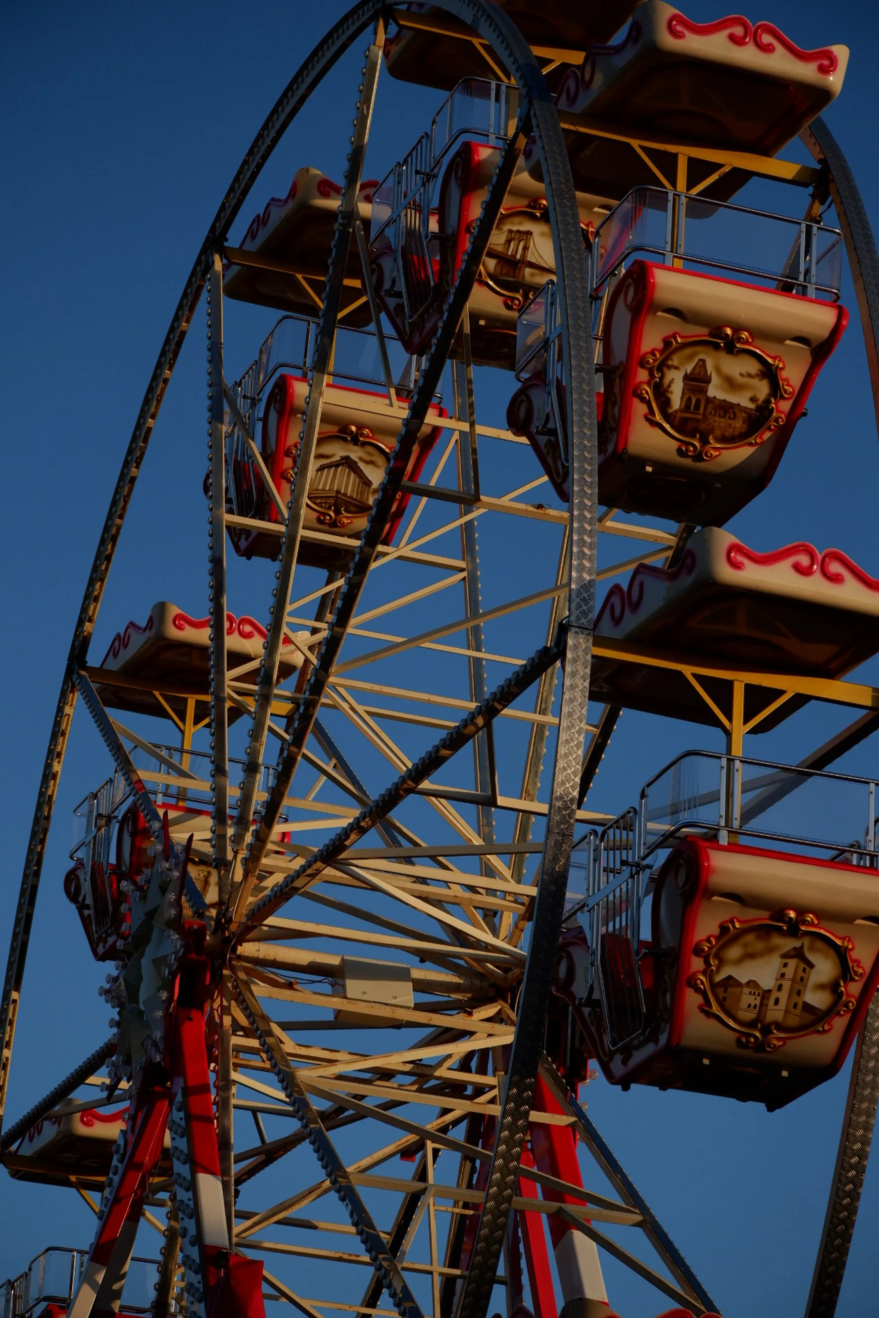 Old style ferris wheel at sunset 