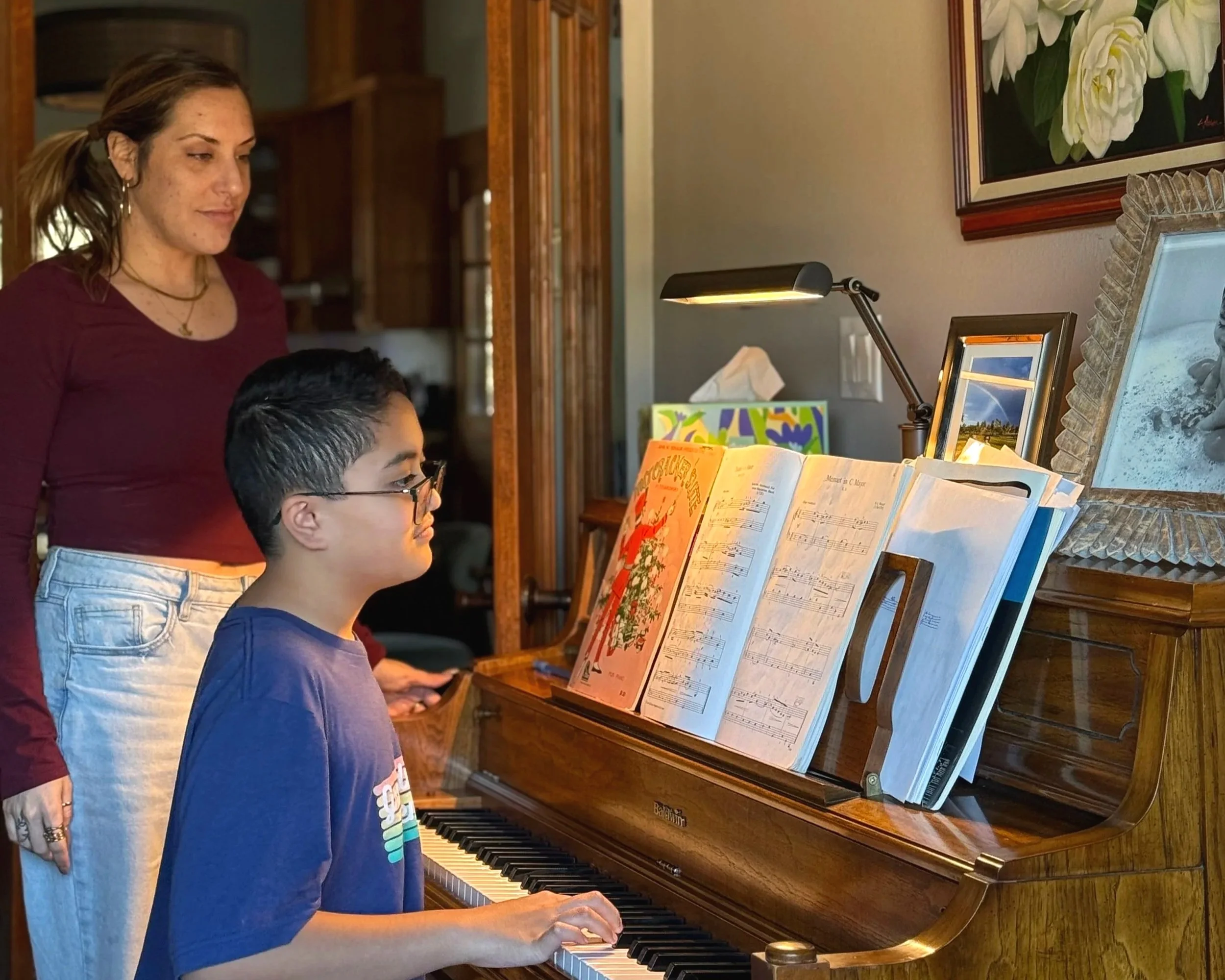 Danny taking piano lesson at home with Alex