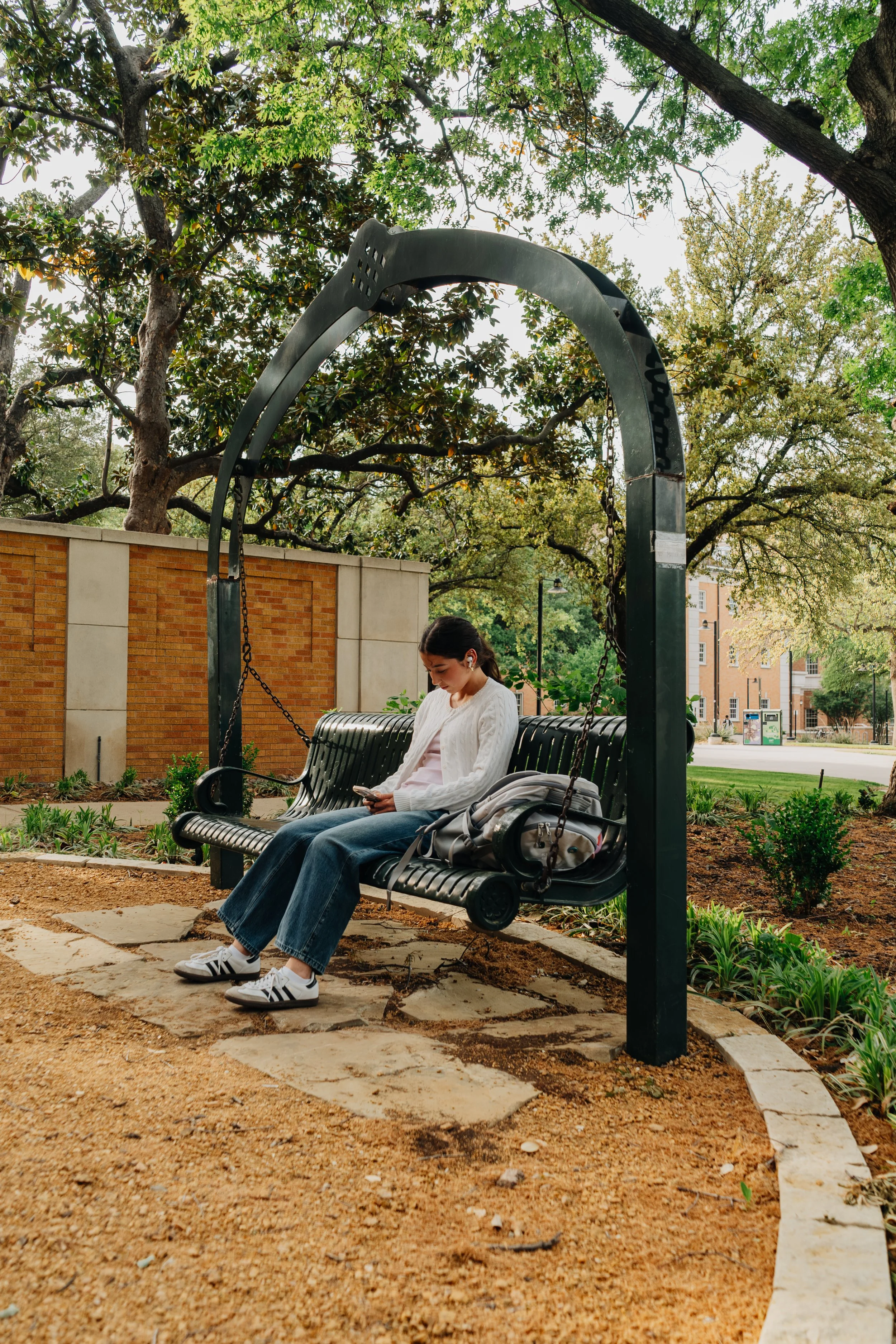 Harmony
-
Mia Rodriguez, a junior at the University of North Texas, relaxes on a swing outside the administration building after a long day of classes in Denton, Texas. Warmer spring weather has begun to settle into the area.