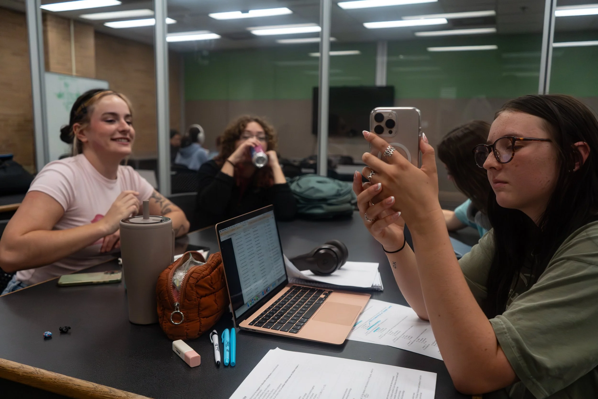 Show and Tell
-
During what Makena calls a "brain break”, she shares a TikTok with her friends Paige Murray
and Mackenzie. The breaks are needed as she prepares for a 200-question final for her Chemistry
class.