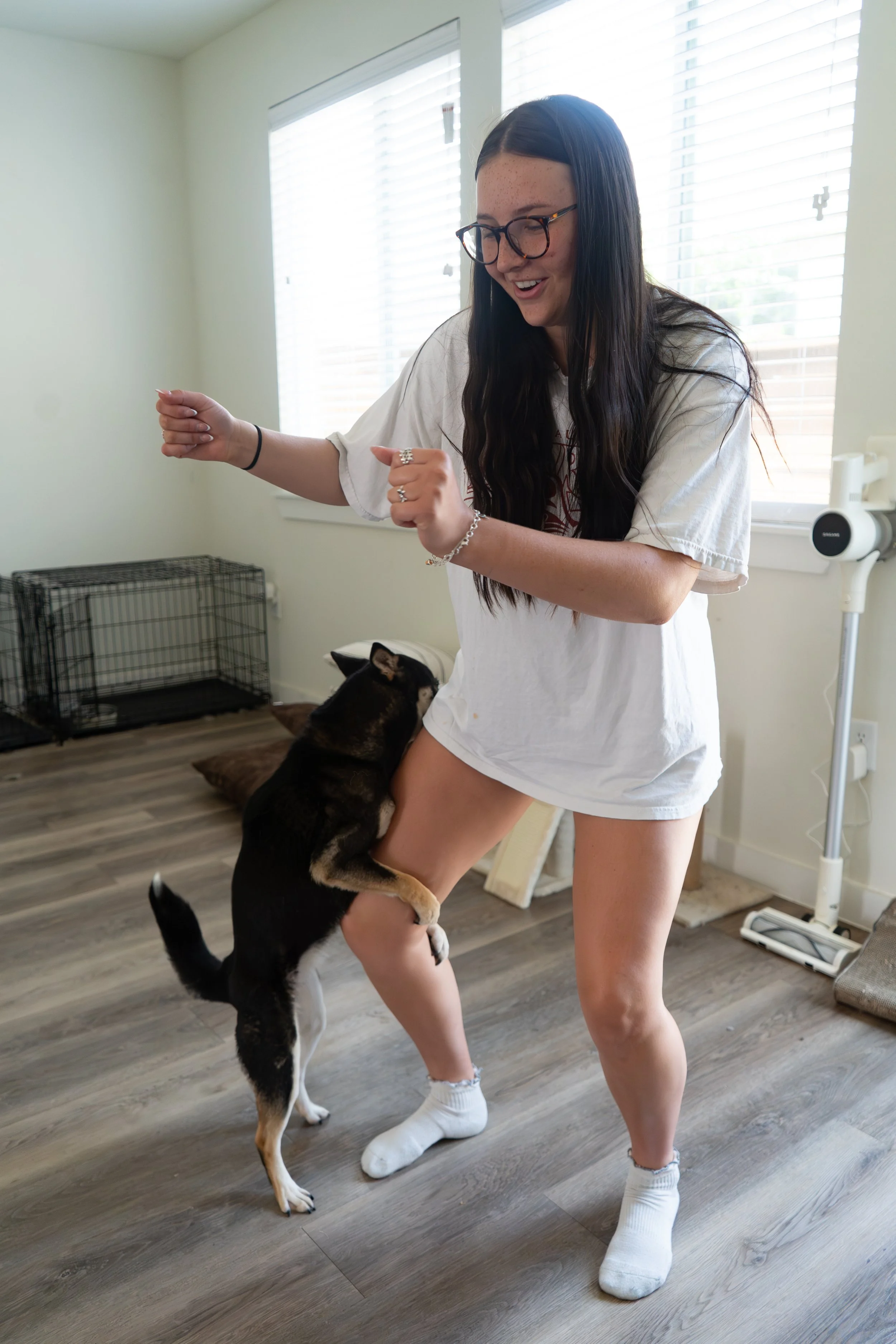 Awkarddd
-
Makena and her dog Kona share the floor as another TikTok is being recorded. Kona releases
some excitement after being chased by her brother, Sosa.