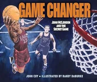 Cover of a book titled 'Game Changer' with a basketball player about to dunk, two other players in the background, and a basketball hoop and net.