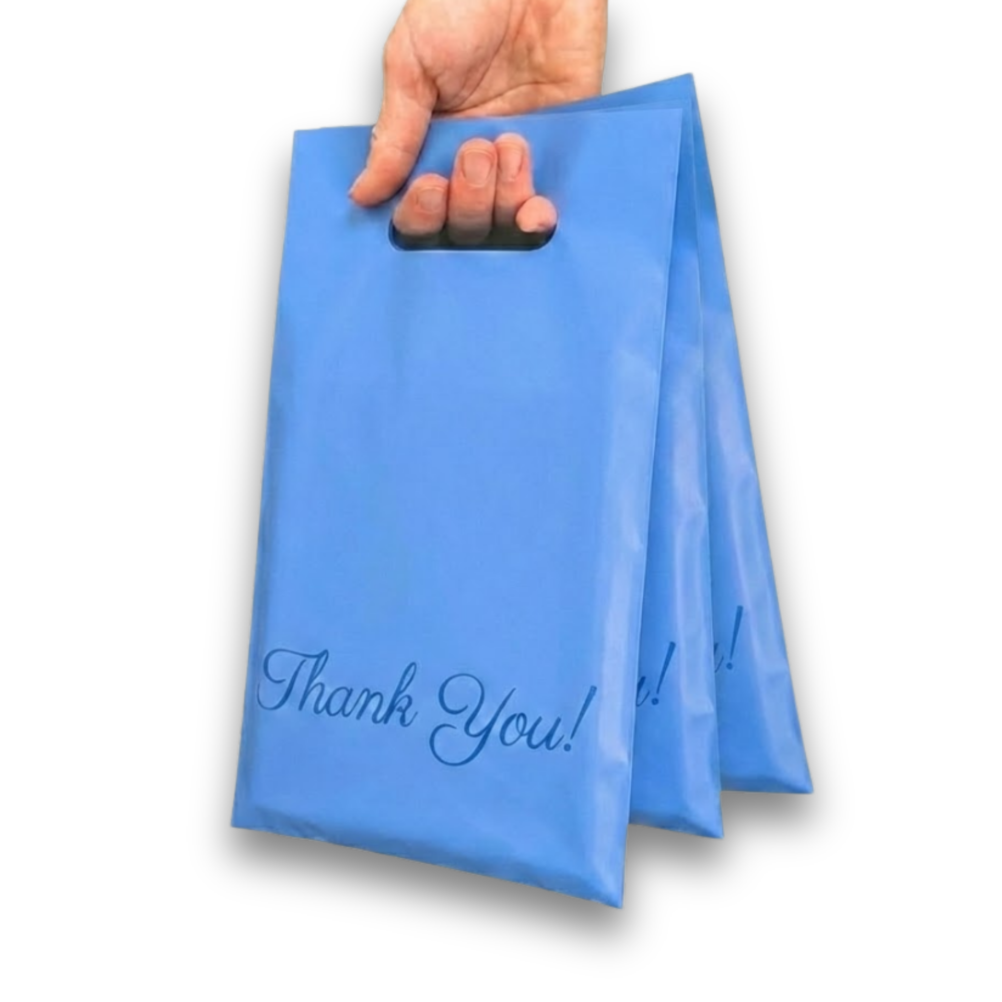 A person's hand holding a blue paper bag with a plastic handle, printed with the words "Thank You!" in cursive.
