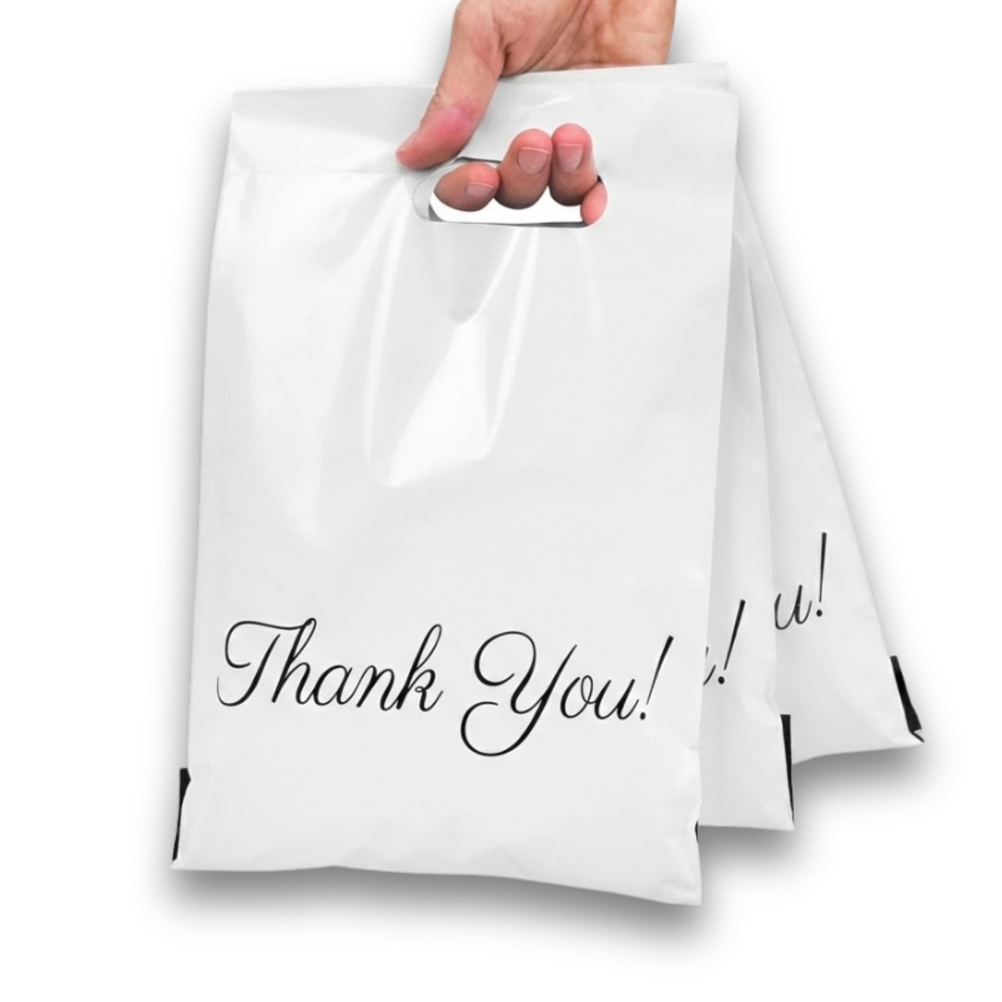 Hand holding a white paper bag with a handle, with 'Thank You!' written on the front.