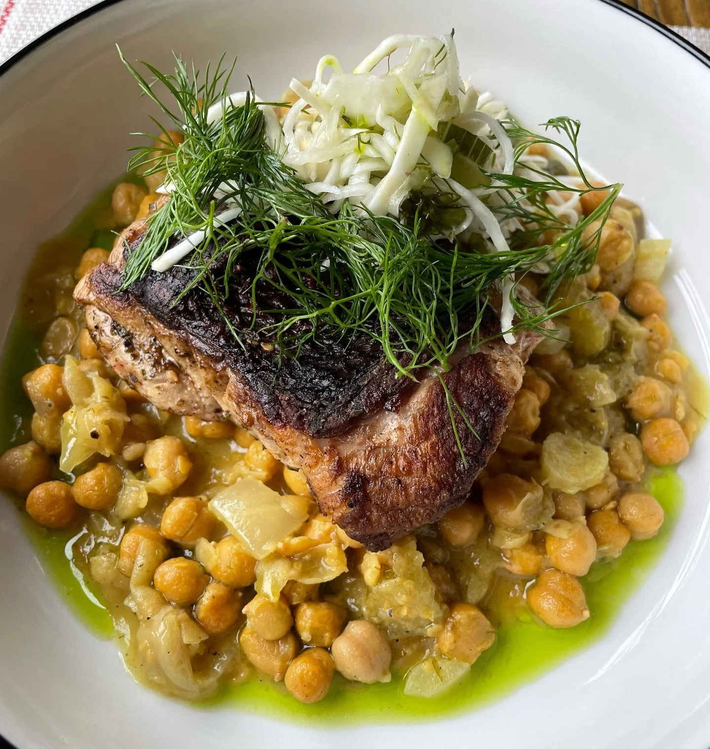 Red silk snapper with revithada (chickpea stew), celeriac, fennel, and caper lemon &mdash; bright, bold, and full of flavor.

Stina is open Tuesday&ndash;Saturday, 12&ndash;10 PM.
&bull;
#StinaPhilly #SouthPhillyEats #MediterraneanFood #PhillyFoodie