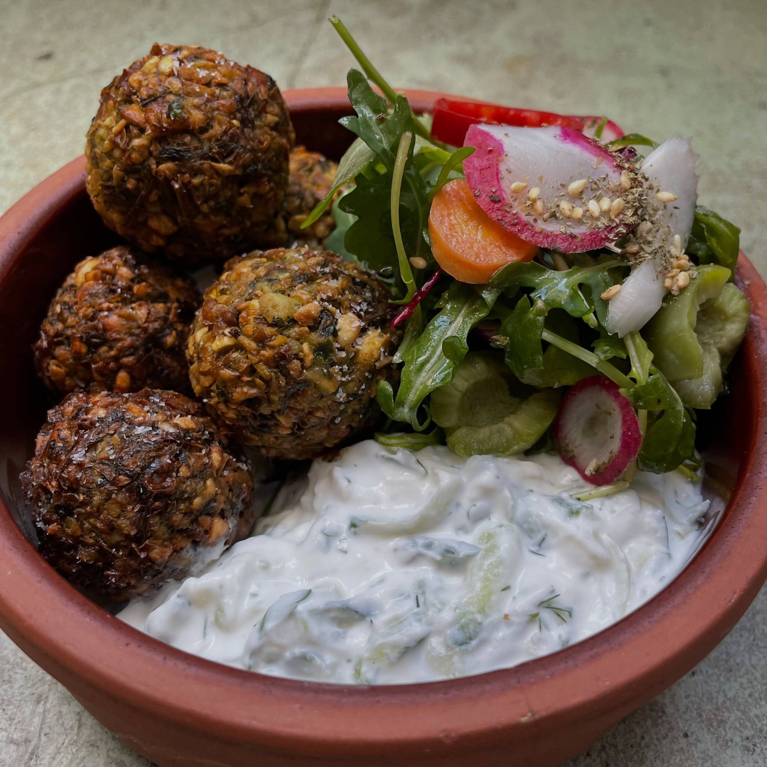 Made for the table and best enjoyed together.🔥

Crispy fried falafel served with tahini, tzatziki, and house pickled things&mdash;made for passing, sharing, and reaching for one more bite.

Stina is open 12pm-10pm Tues-Sat
&bull;
#greek #greekfood #