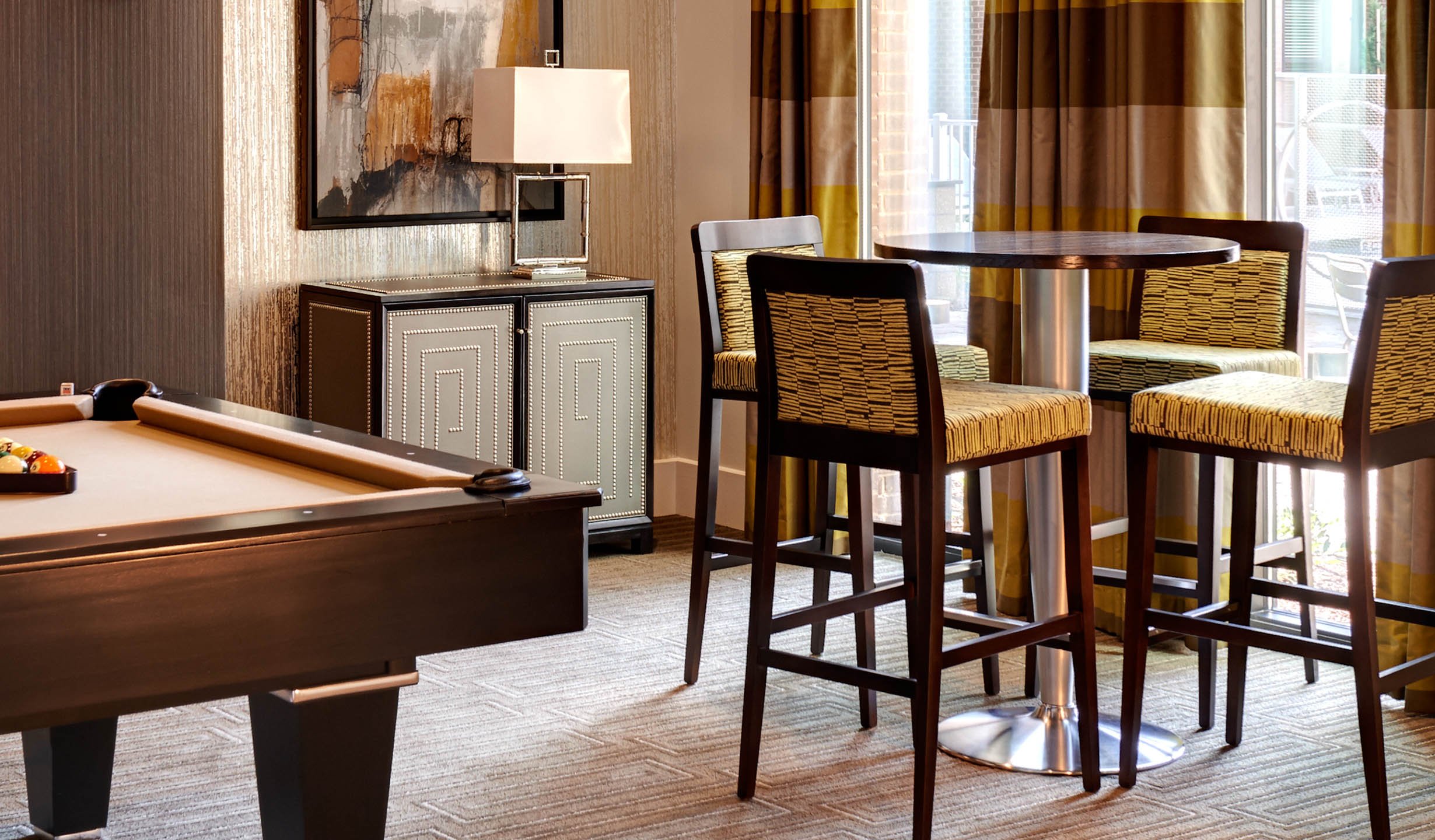 Luxury multifamily interiors for Marq at Crabtree. Studio Schelfe curated resort-inspired amenity spaces and co-working hubs adjacent to Raleigh's premier shopping district.