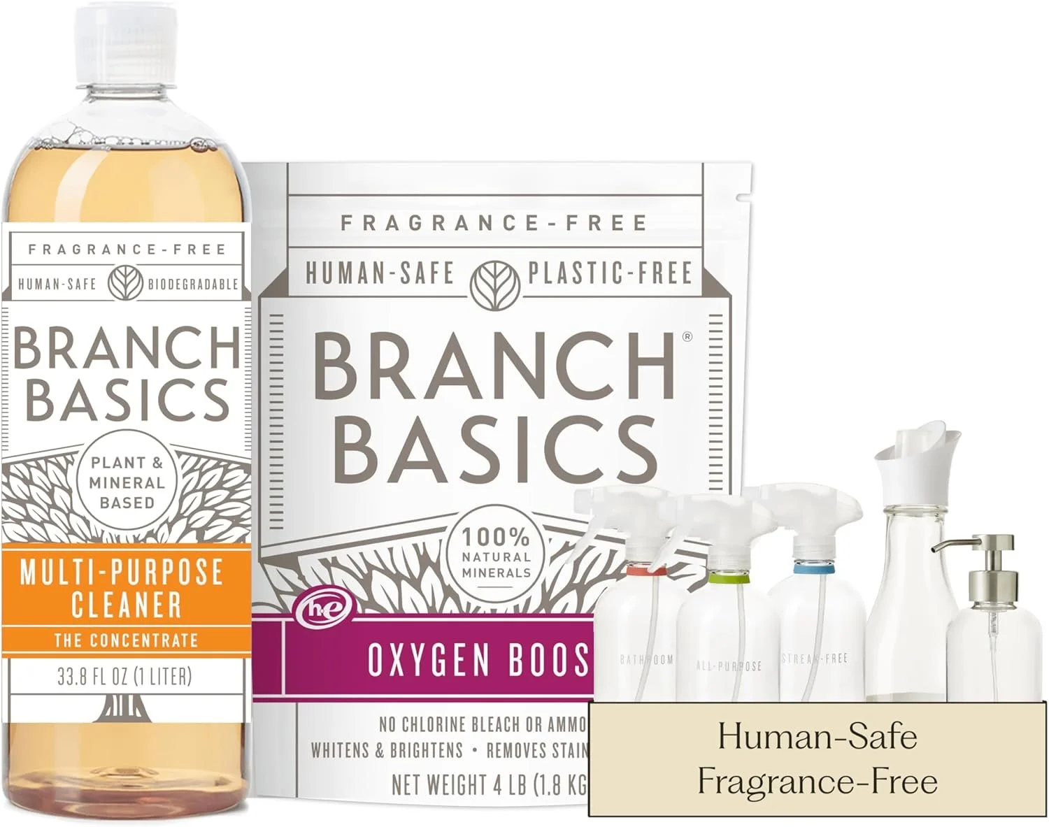 A collection of eco-friendly cleaning products including a bottle of multi-purpose cleaner, a pack of plant-based cleaning tablets, and several spray bottles, all labeled as human-safe and fragrance-free.