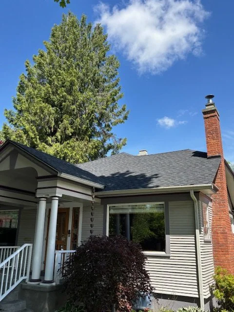 Completed residential roof installation by Willenborg Roofing on a North Idaho home with asphalt shingles.