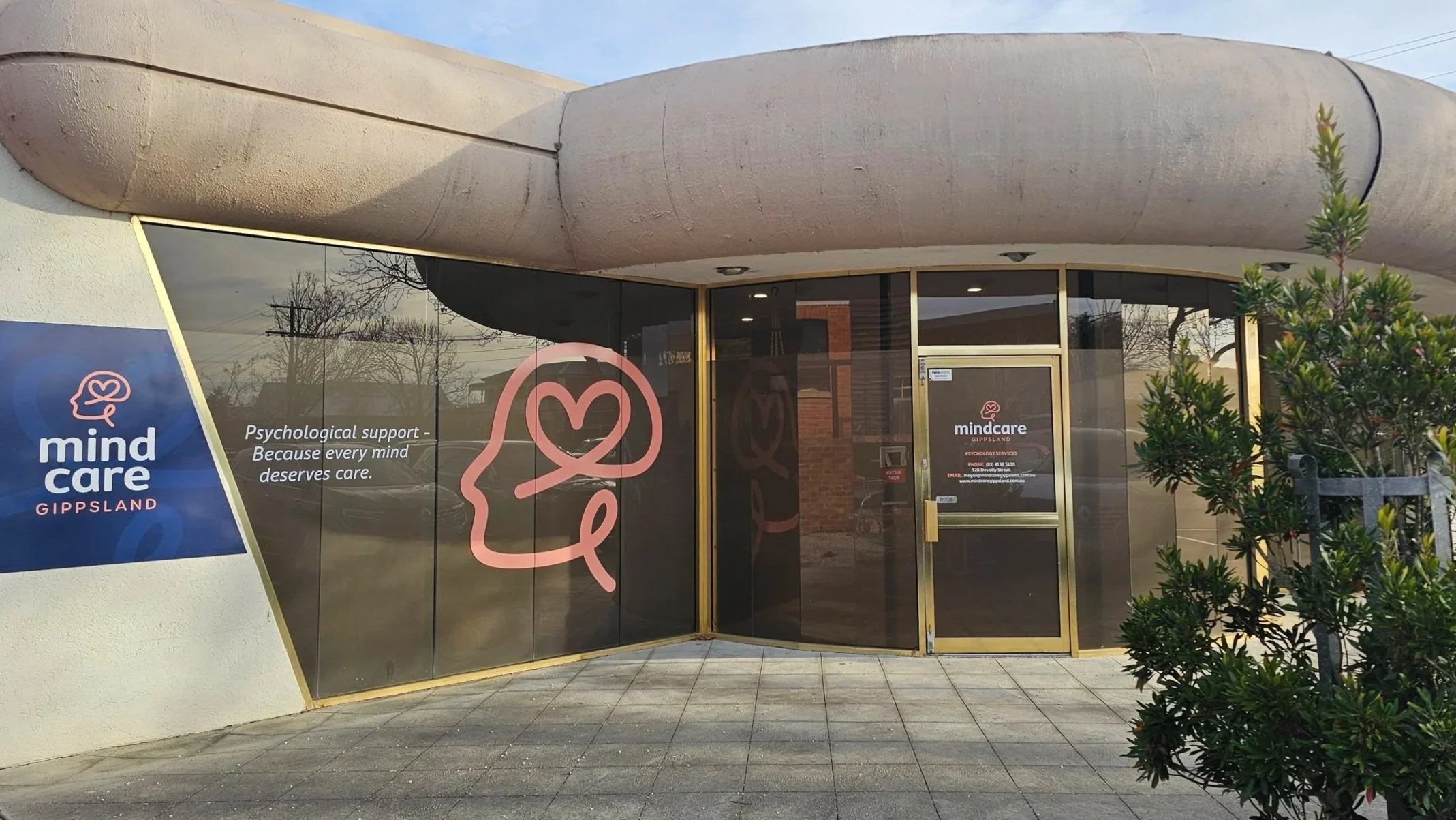 “Street‑facing office front of MindCare Gippsland, featuring a professional, welcoming exterior with clear signage and large front windows.”