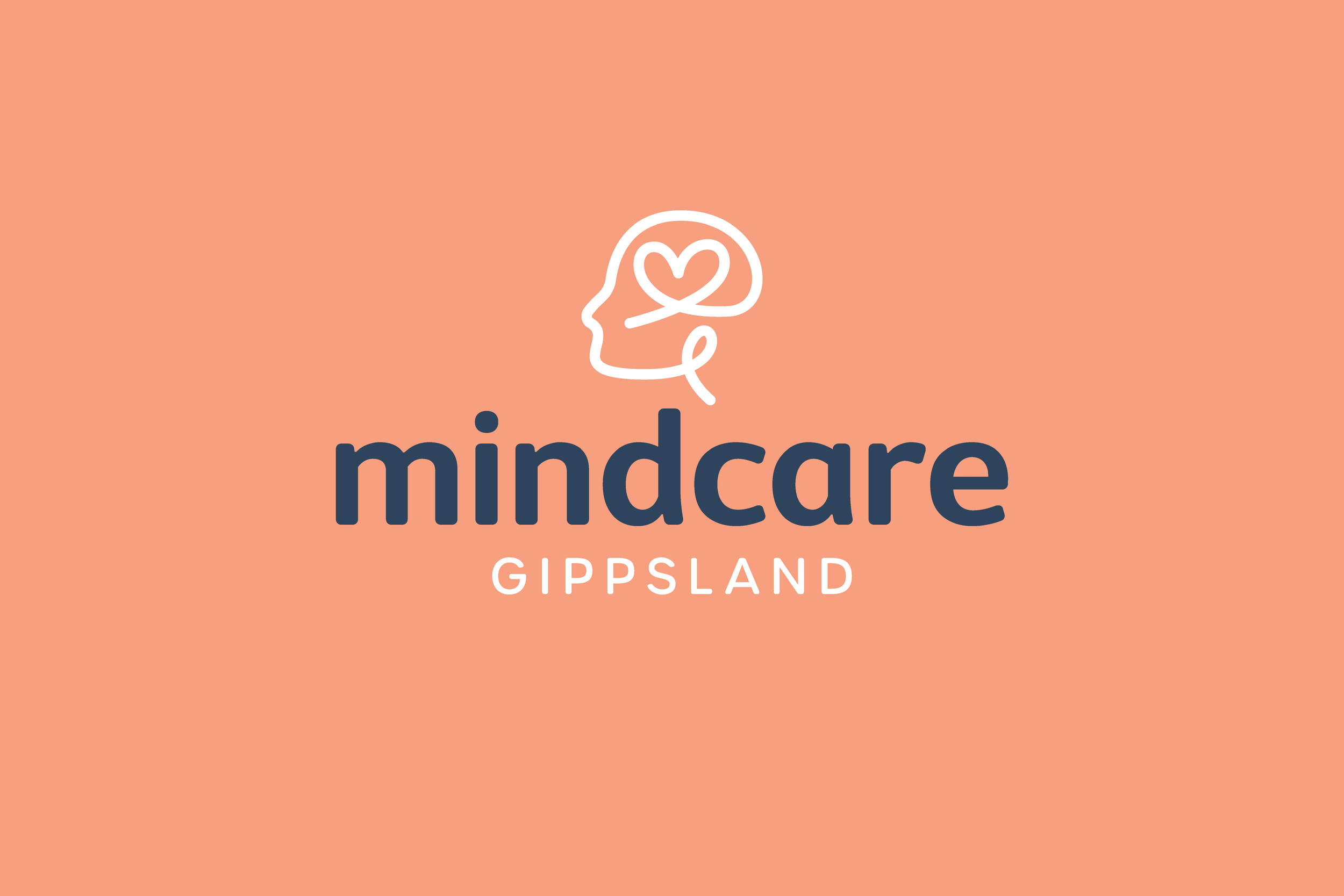 Logo for Mindcare Gippsland featuring a white outline of a human head with a heart-shaped brain inside, on a peach background, with the text 'mindcare' in dark blue and 'GIPPSLAND' in white below.